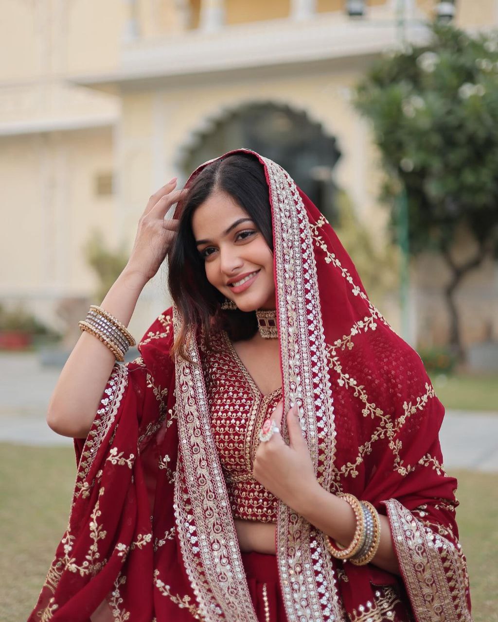 Sarvamangala red faux georgette zari lehenga set