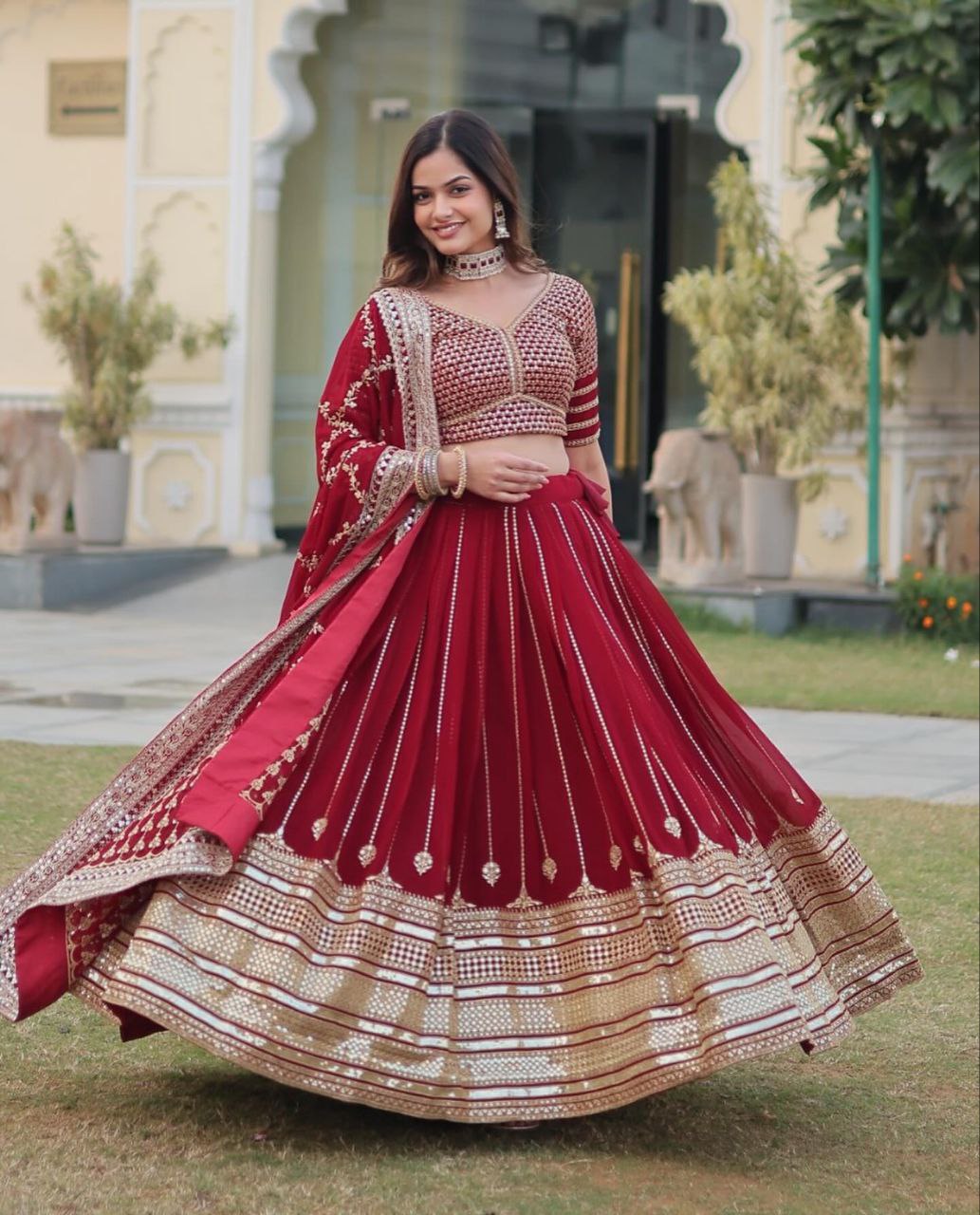 Sarvamangala red faux georgette zari lehenga set