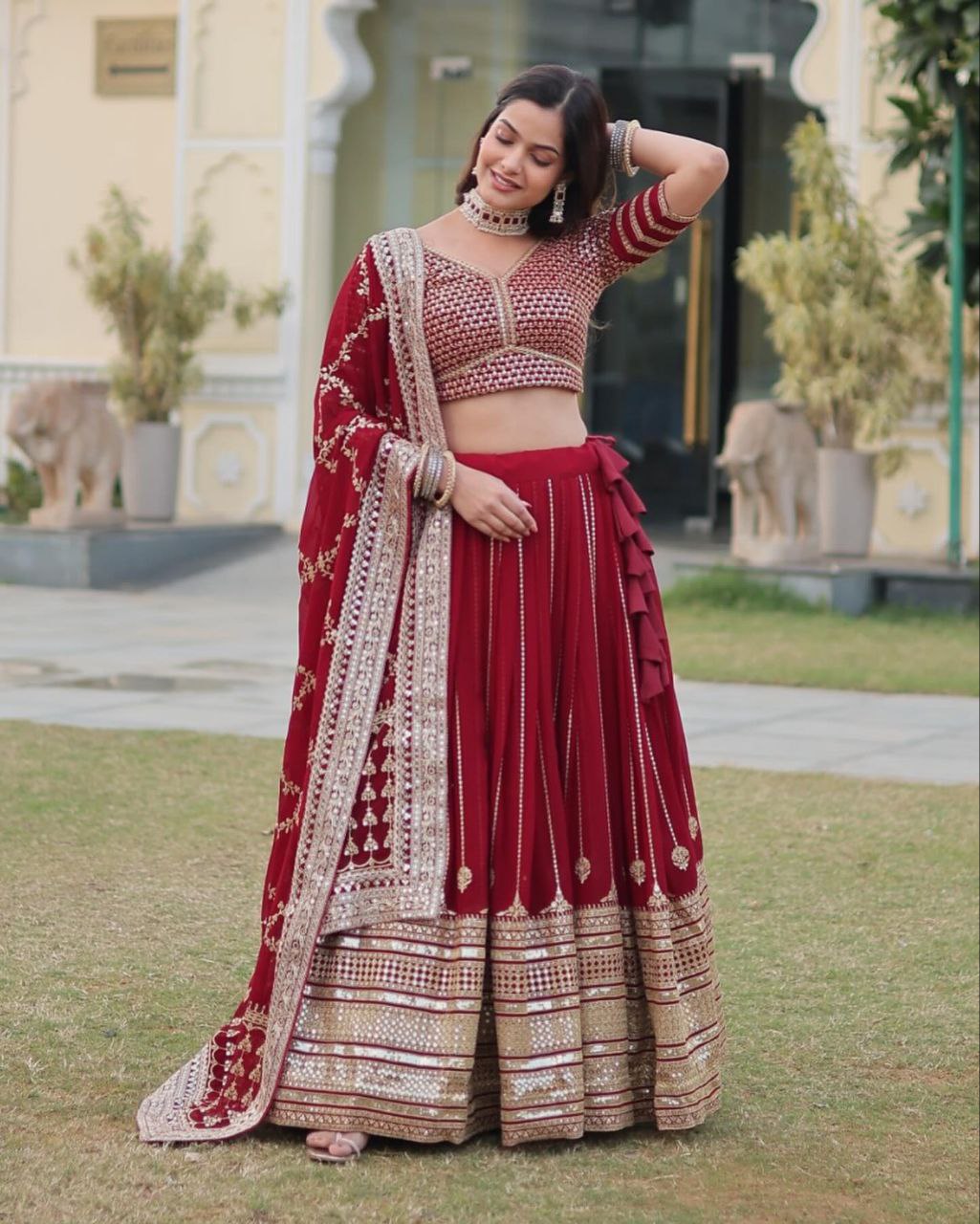 Sarvamangala red faux georgette zari lehenga set