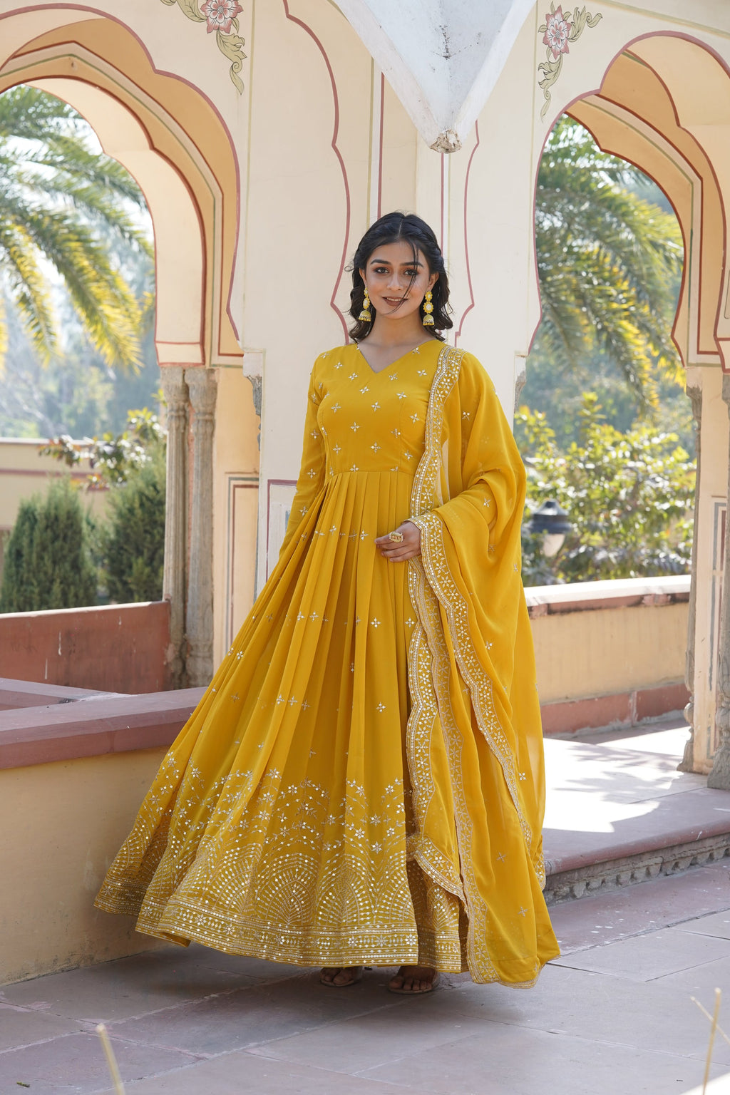 Rithanya yellow georgette embroidered anarkali gown set