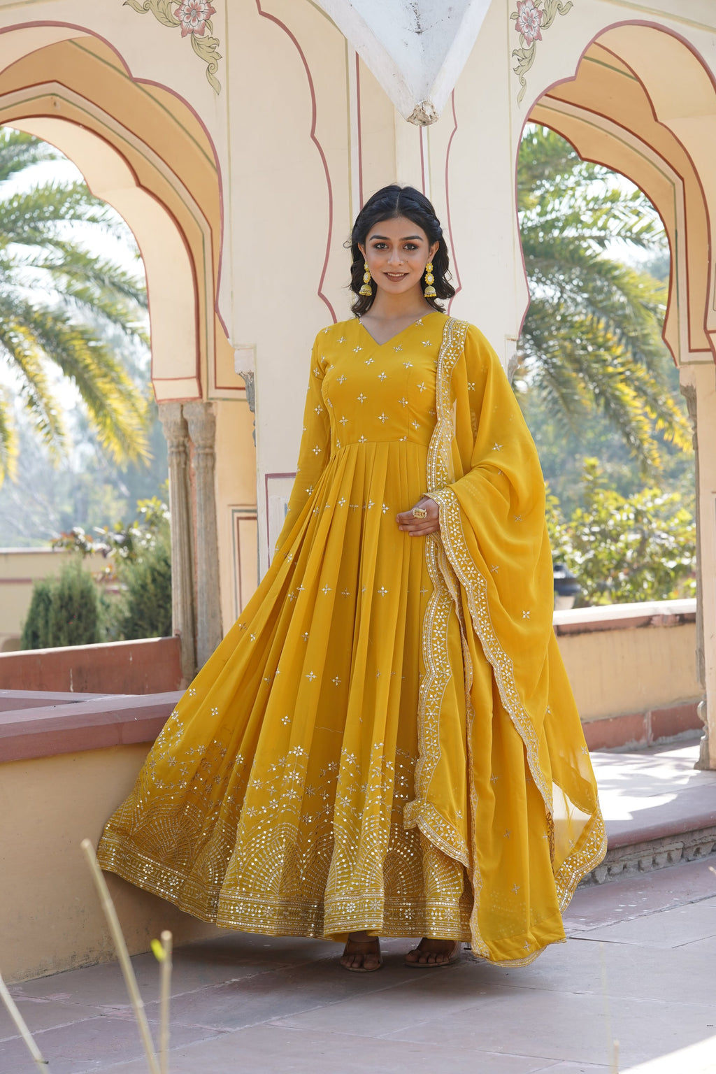 Rithanya yellow georgette embroidered anarkali gown set