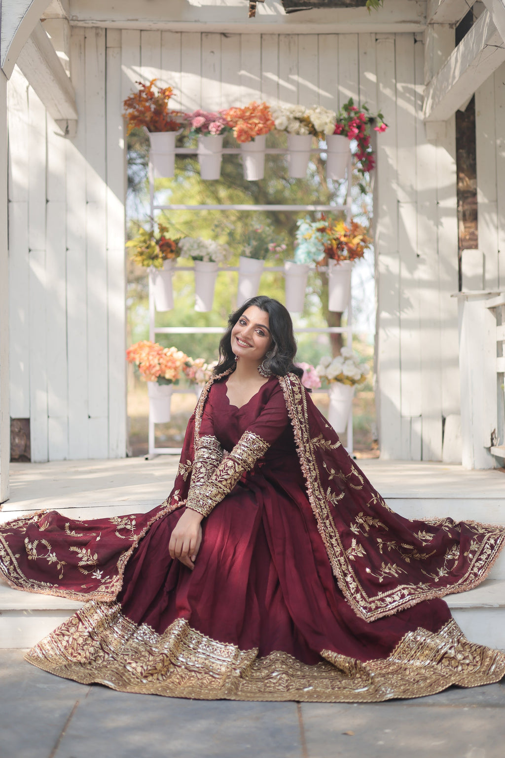 Maroon embroidered Savi designer flared Anarkali gown