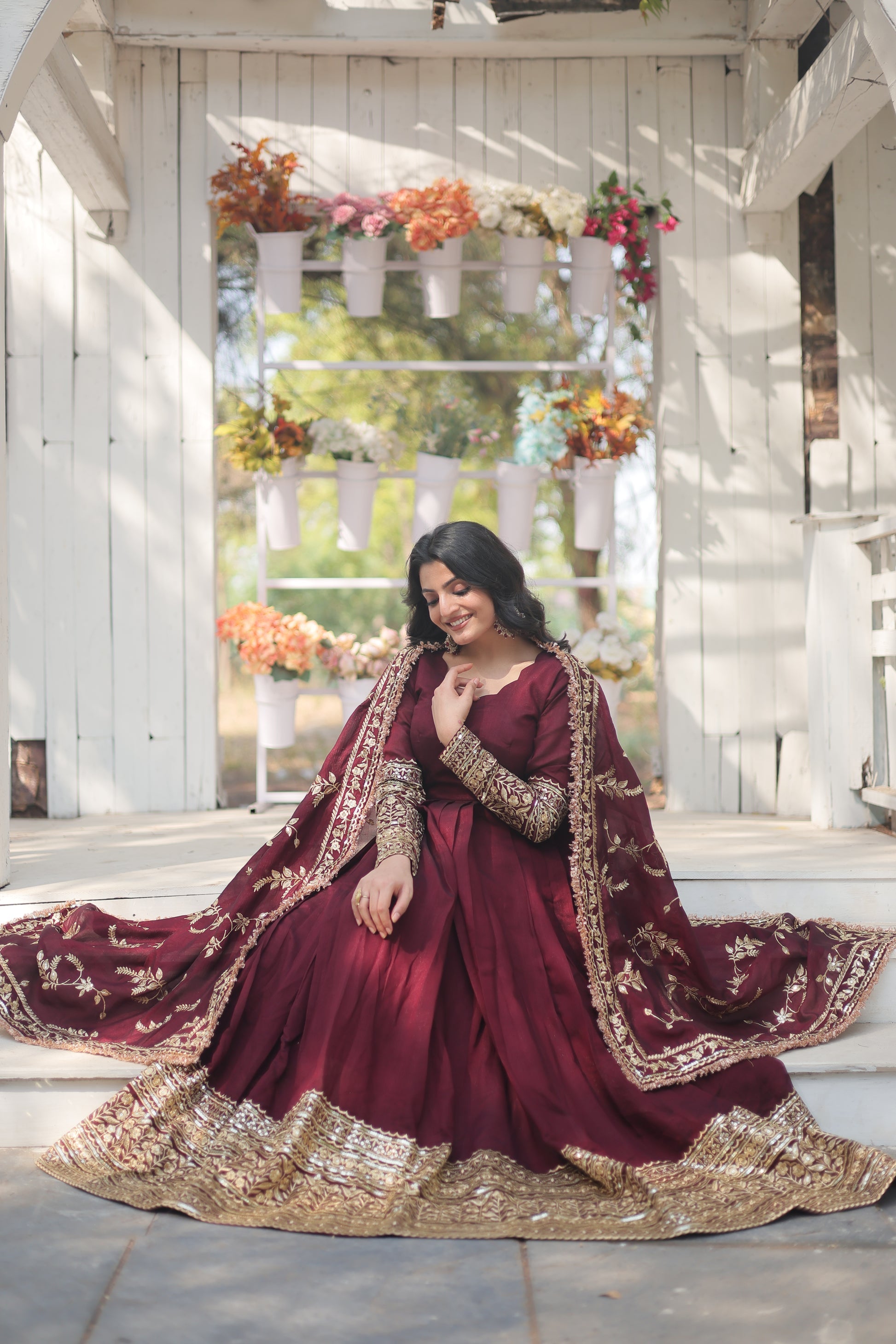 Maroon embroidered Savi designer flared Anarkali gown