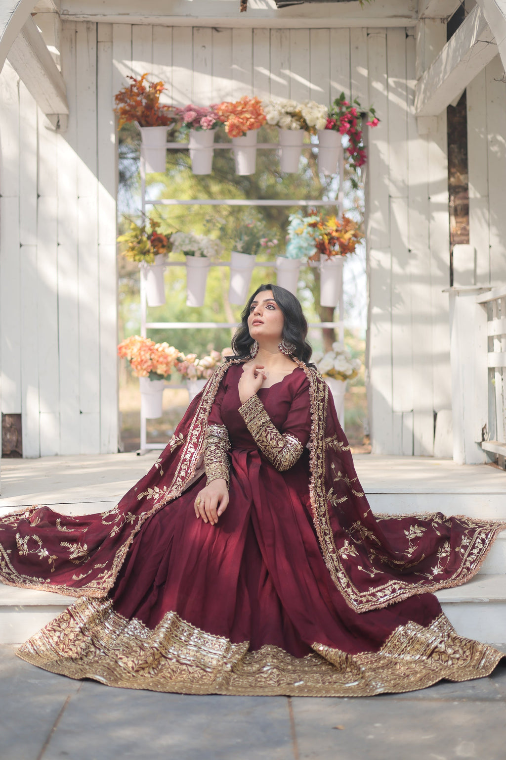 Maroon embroidered Savi designer flared Anarkali gown