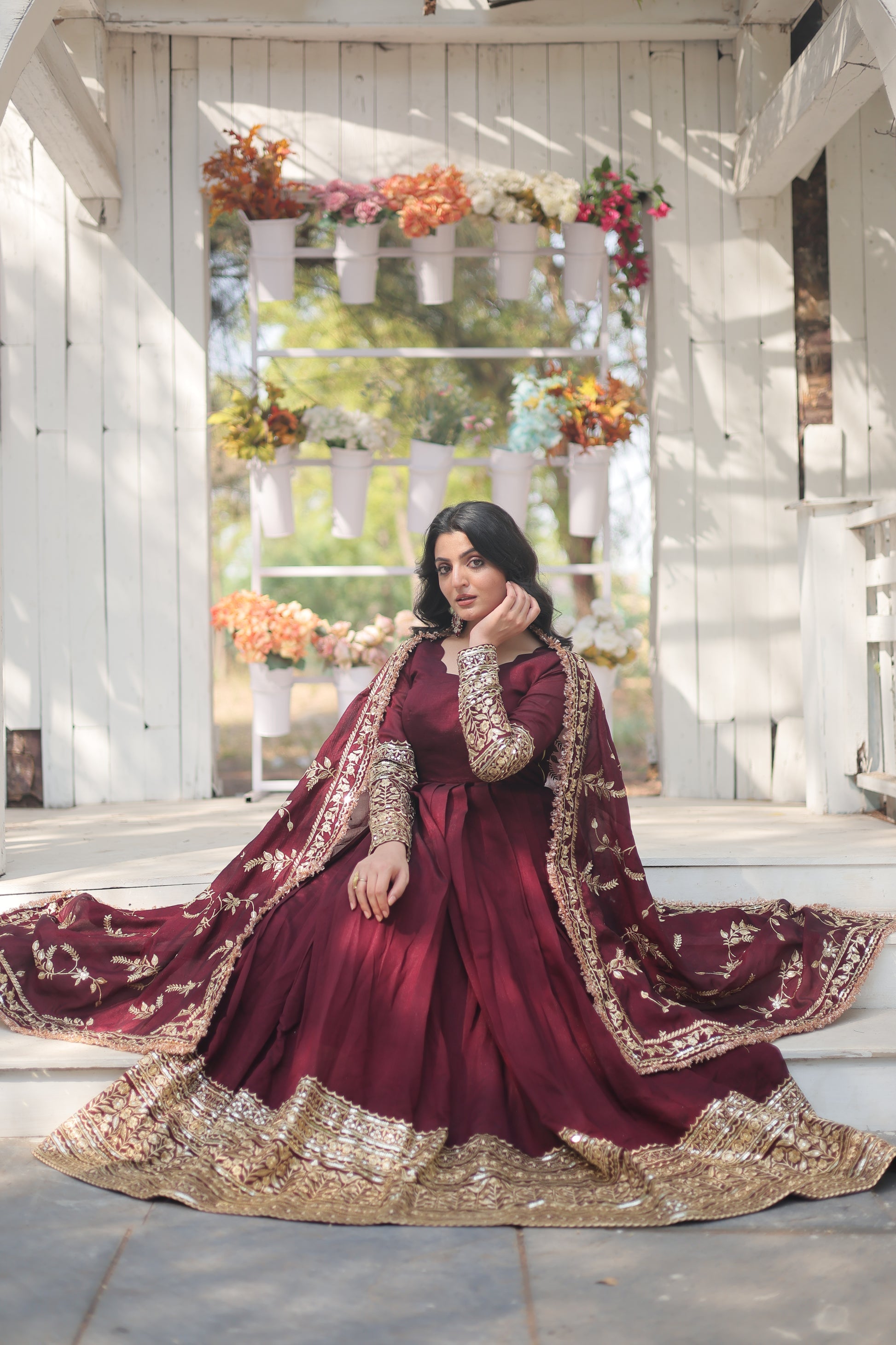 Maroon embroidered Savi designer flared Anarkali gown