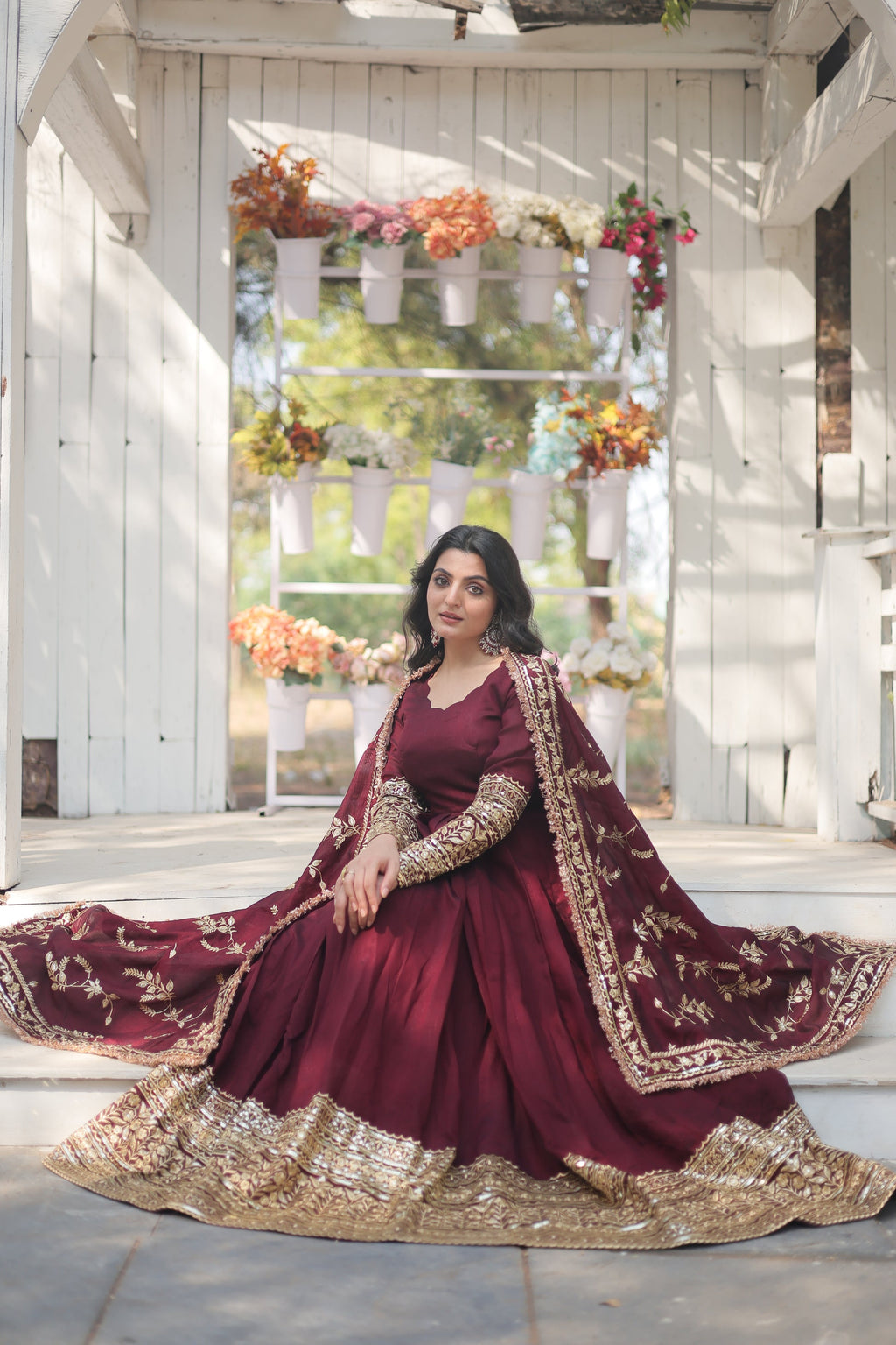 Maroon embroidered Savi designer flared Anarkali gown