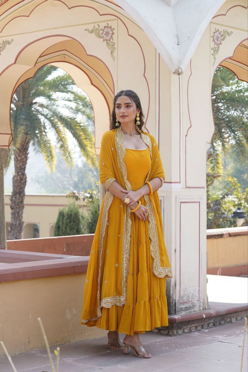 Manohari yellow georgette anarkali gown suit set