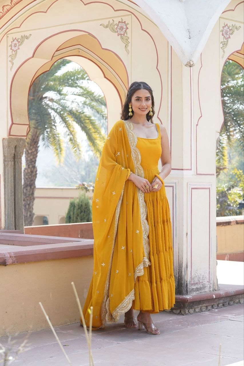 Manohari yellow georgette anarkali gown suit set