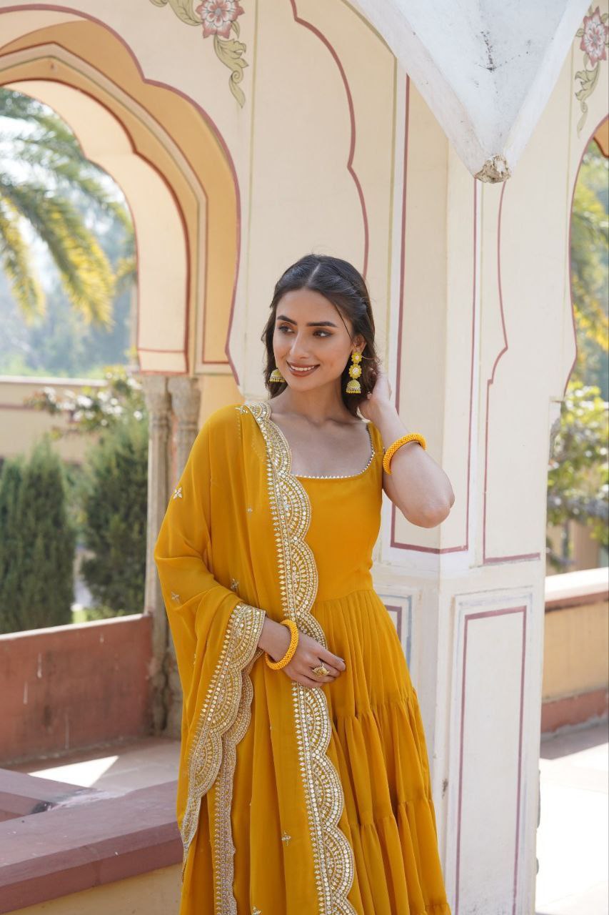 Manohari yellow georgette anarkali gown suit set