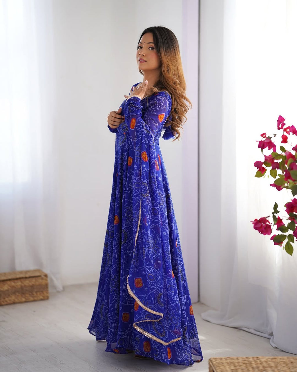 Shanvi Bandhej Chiffon Anarkali Suit Set – blue Bandhej Anarkali gown, traditional chiffon ethnic wear, women’s blue ethnic dress, Bandhej printed Anarkali for weddings, designer ethnic gown, Anarkali suit with lace dupatta, flair Anarkali with full sleeves, Bandhej print ethnic dress, blue festival wear gown, Indian wedding guest Anarkali.