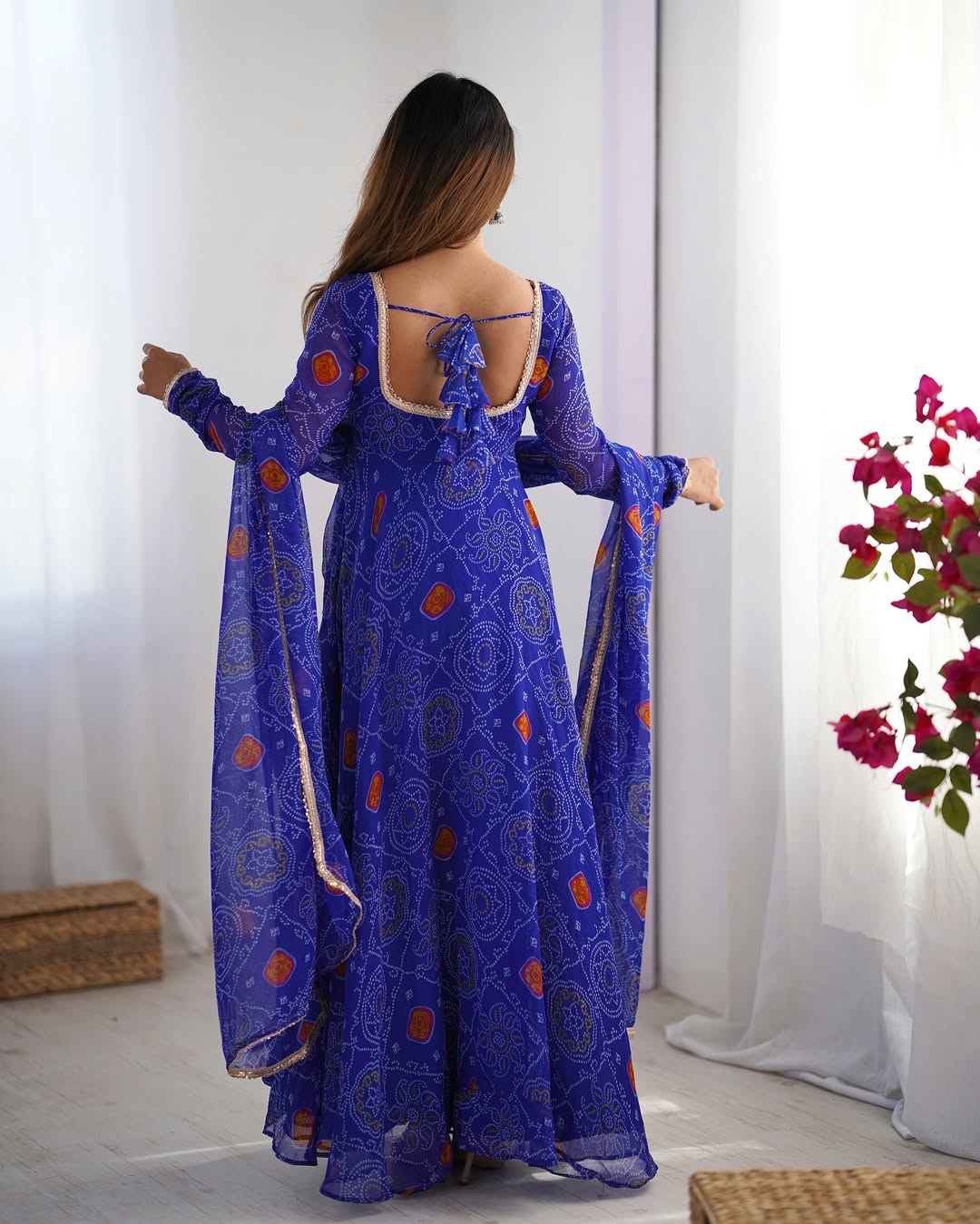 Shanvi Bandhej Chiffon Anarkali Suit Set – blue Bandhej Anarkali gown, traditional chiffon ethnic wear, women’s blue ethnic dress, Bandhej printed Anarkali for weddings, designer ethnic gown, Anarkali suit with lace dupatta, flair Anarkali with full sleeves, Bandhej print ethnic dress, blue festival wear gown, Indian wedding guest Anarkali.