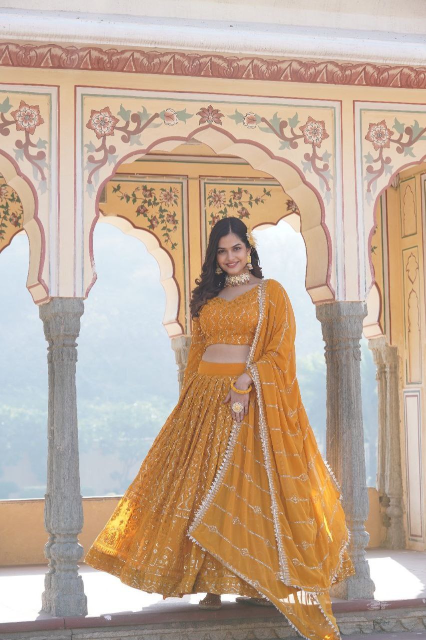 Kalika yellow georgette embroidered lehenga set