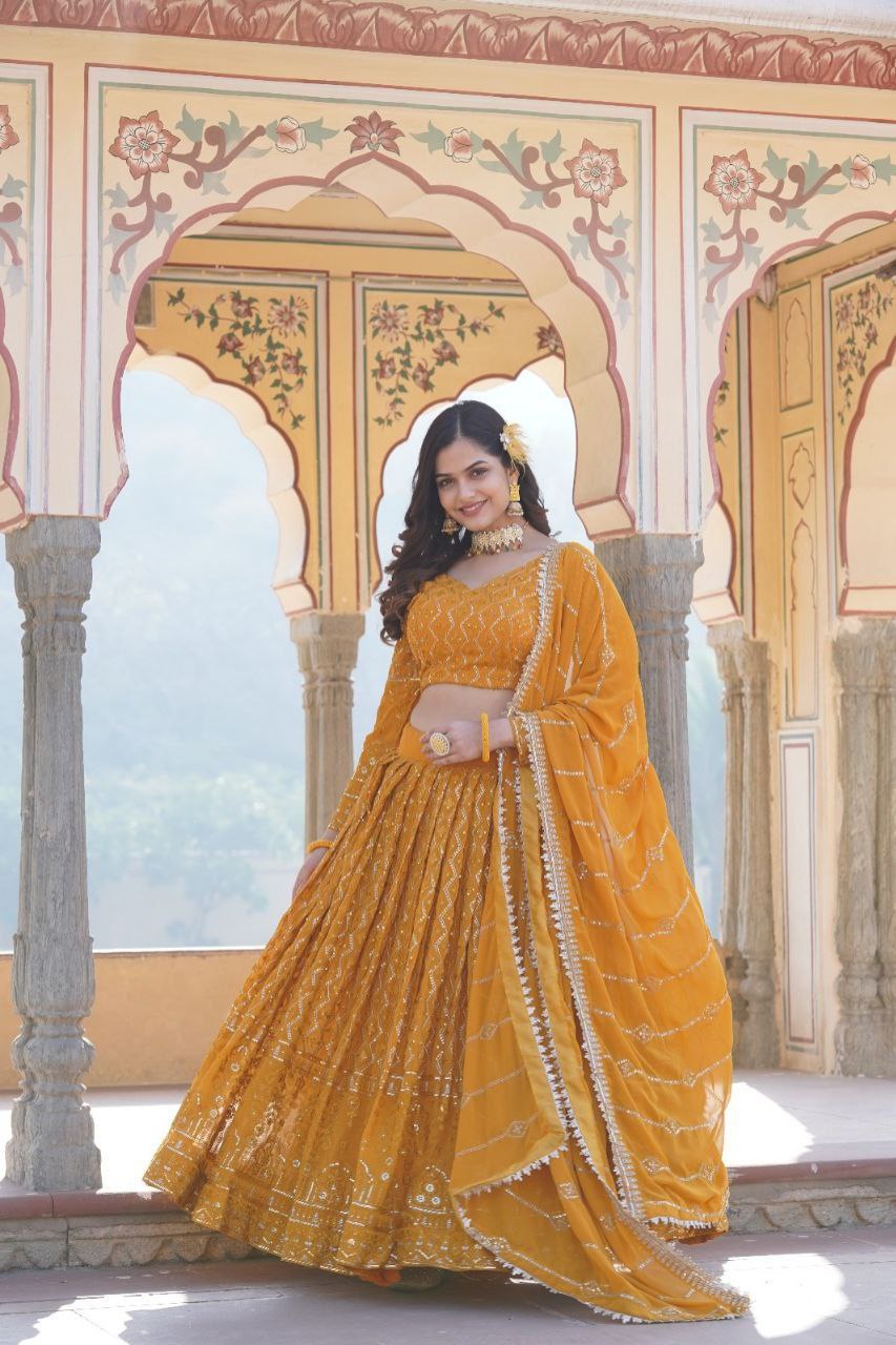 Kalika yellow georgette embroidered lehenga set