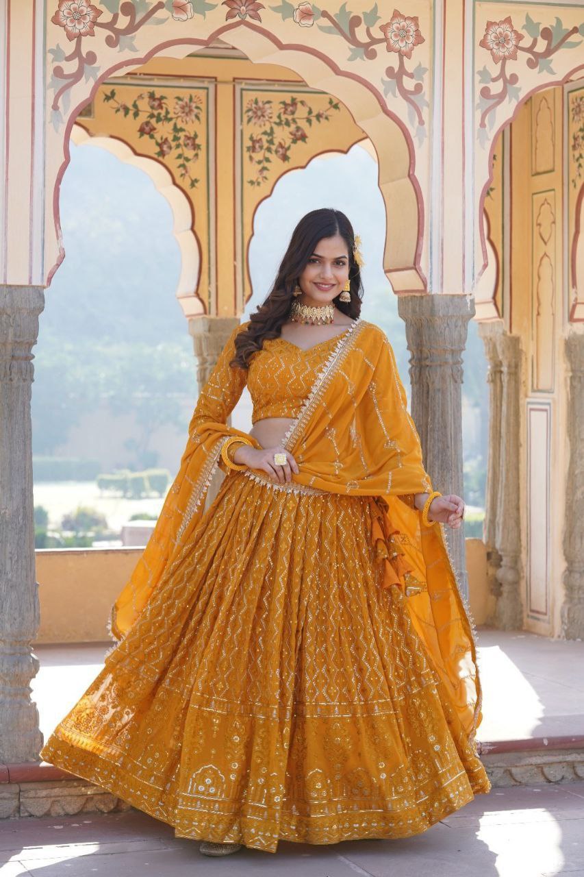 Kalika yellow georgette embroidered lehenga set