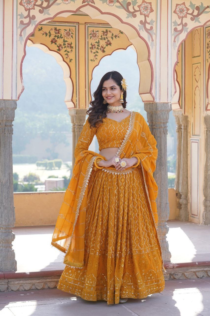 Kalika yellow georgette embroidered lehenga set