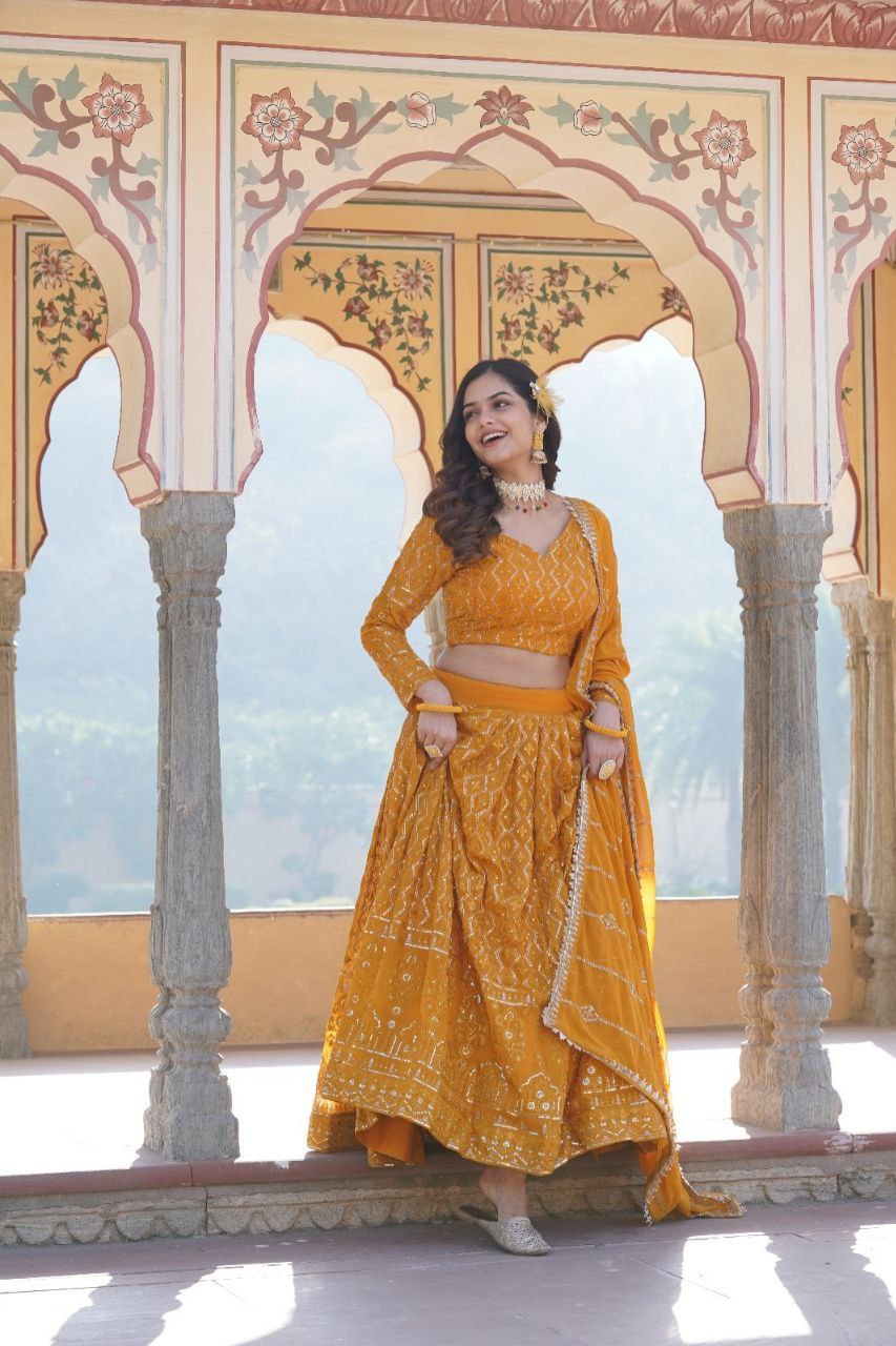 Kalika yellow georgette embroidered lehenga set