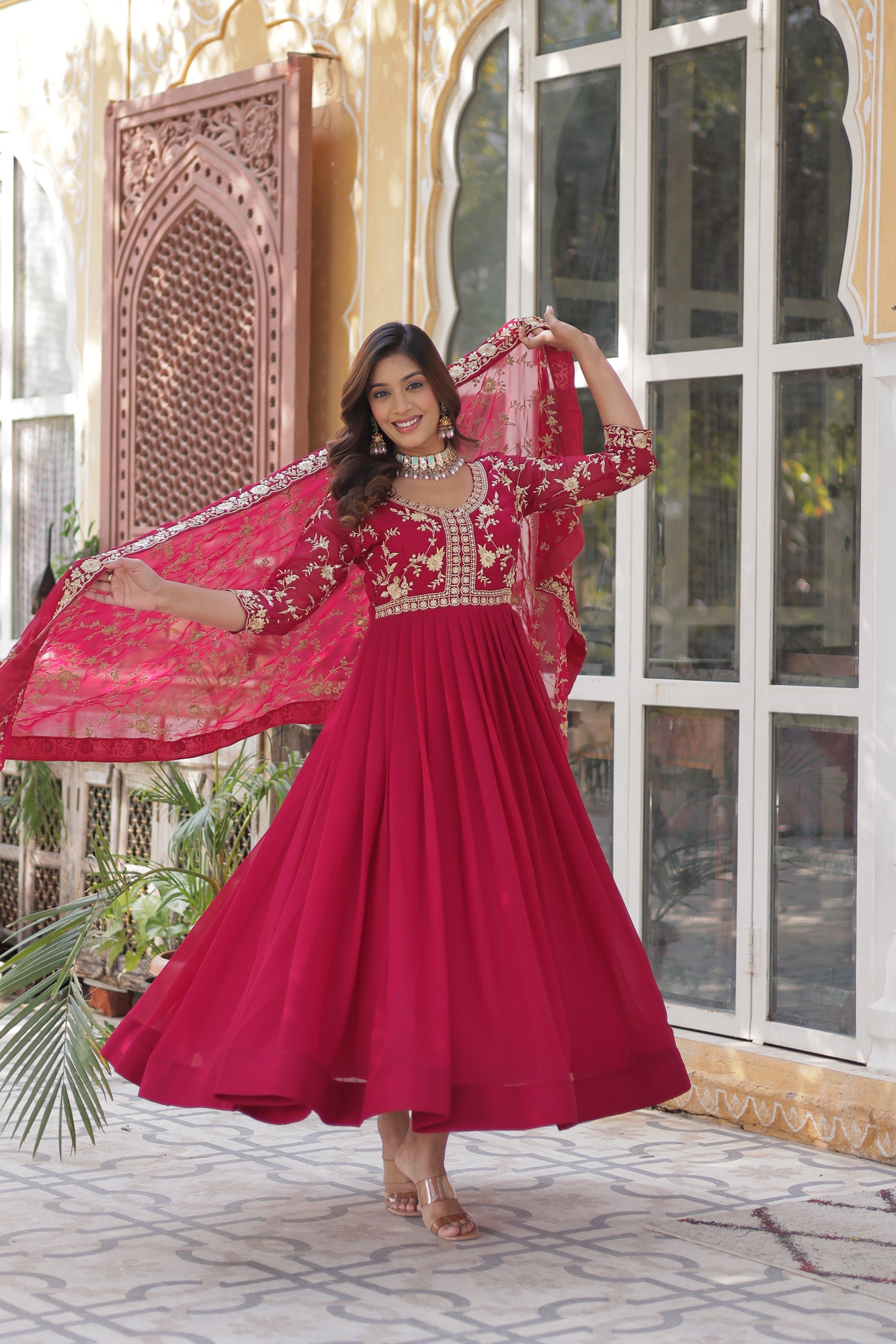  Shivangi pink embroidered Anarkali gown set made from faux blooming fabric with zari and multi-sequins work, featuring 3/4th sleeves and a designer neckline, paired with matching embroidered dupatta – perfect ethnic outfit for weddings, festivals, and special occasions in 2025.