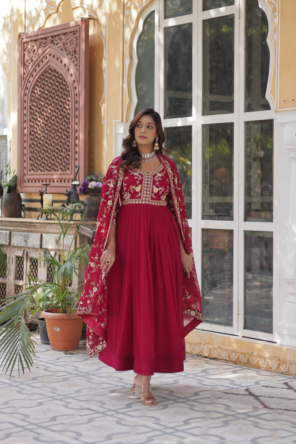  Shivangi pink embroidered Anarkali gown set made from faux blooming fabric with zari and multi-sequins work, featuring 3/4th sleeves and a designer neckline, paired with matching embroidered dupatta – perfect ethnic outfit for weddings, festivals, and special occasions in 2025.