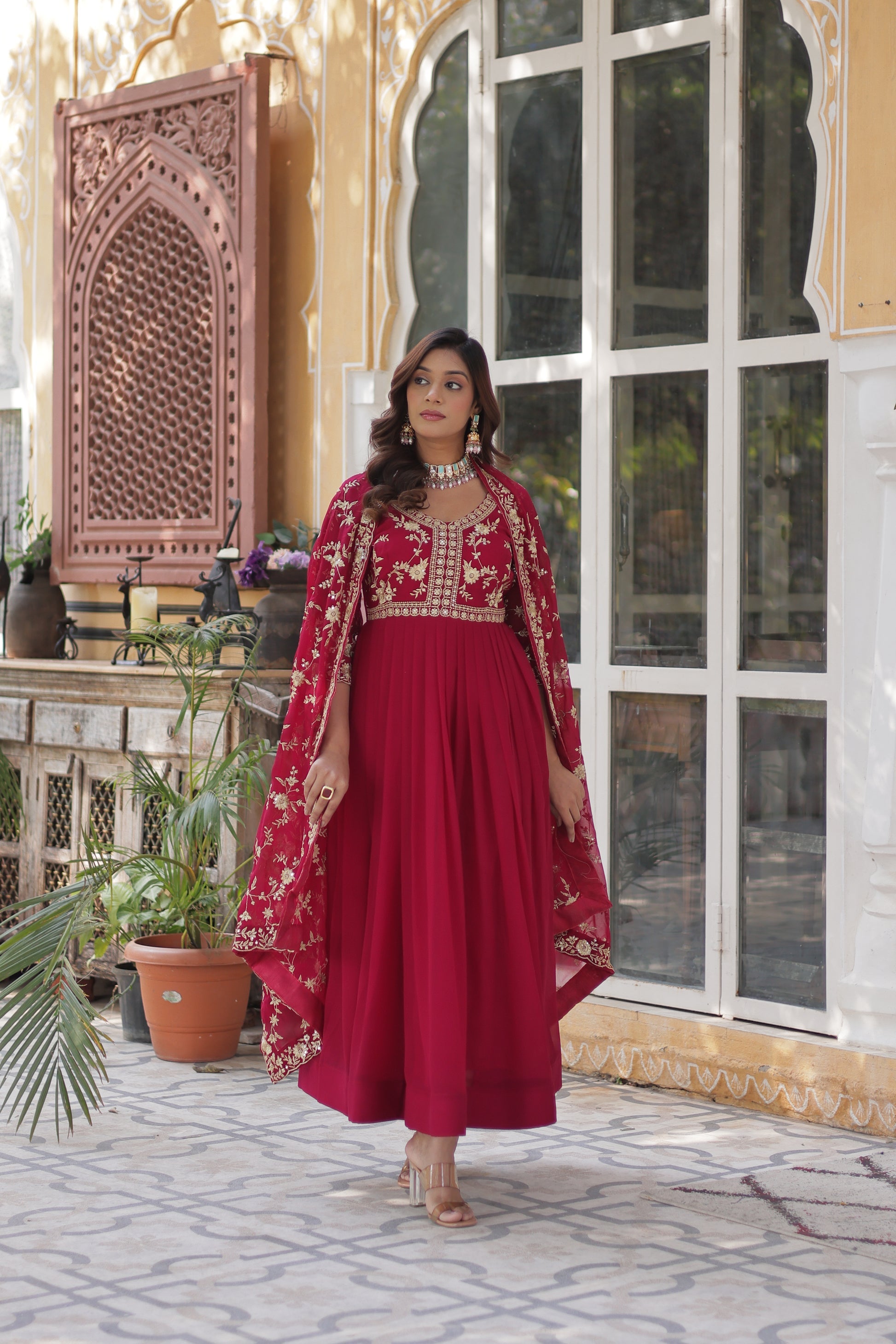  Shivangi pink embroidered Anarkali gown set made from faux blooming fabric with zari and multi-sequins work, featuring 3/4th sleeves and a designer neckline, paired with matching embroidered dupatta – perfect ethnic outfit for weddings, festivals, and special occasions in 2025.