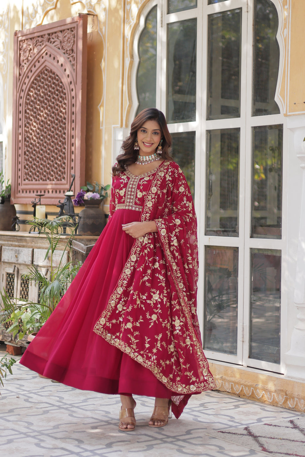  Shivangi pink embroidered Anarkali gown set made from faux blooming fabric with zari and multi-sequins work, featuring 3/4th sleeves and a designer neckline, paired with matching embroidered dupatta – perfect ethnic outfit for weddings, festivals, and special occasions in 2025.