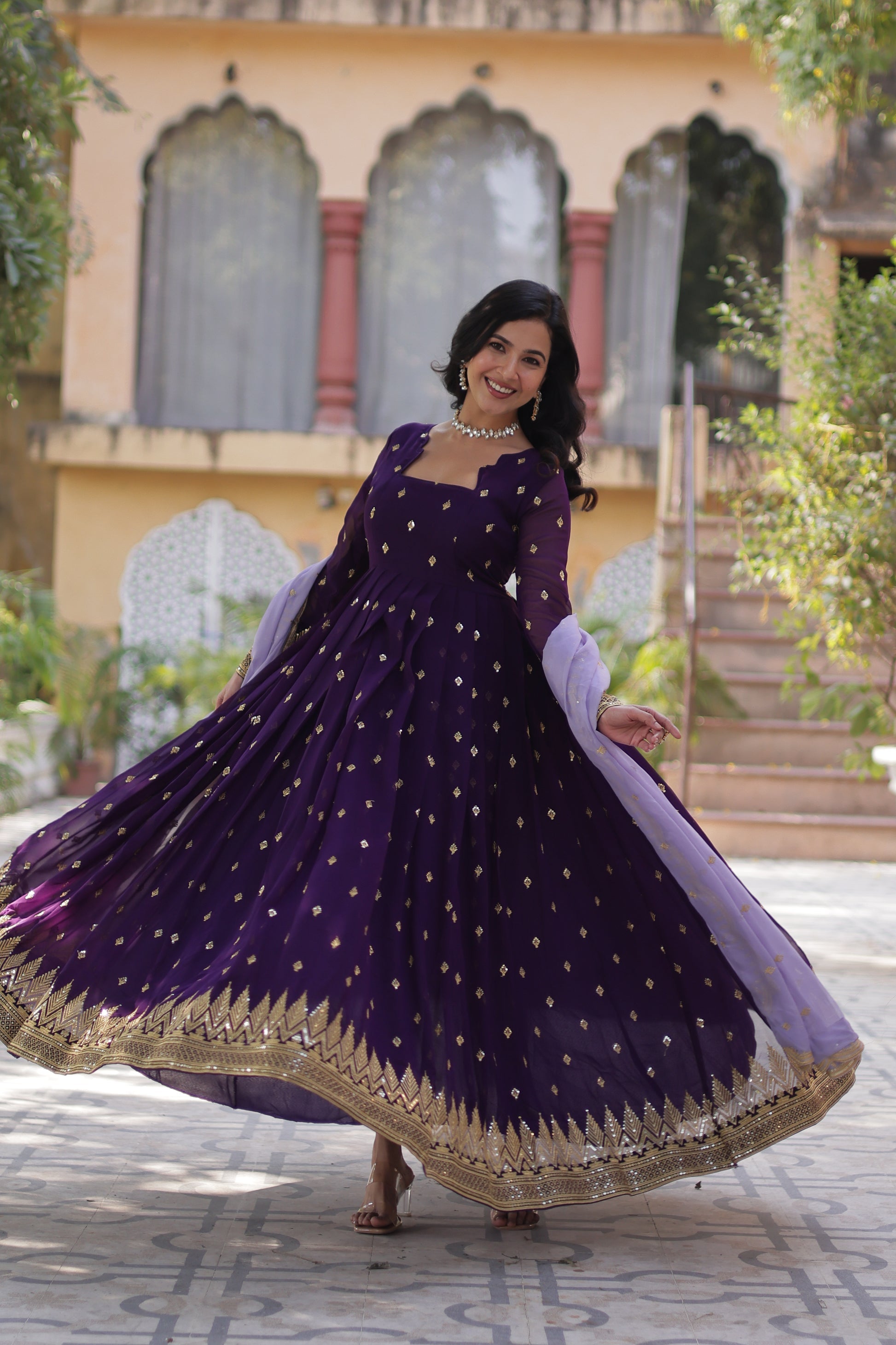  Purple embroidered Anarkali gown set for women with dupatta, designer ethnic gown featuring intricate thread and sequin embroidery, floor-length party wear gown with full sleeves, perfect for wedding guests, festive occasions, and traditional Indian functions, readymade stitched Anarkali gown with elegant styling for ethnic wear trends.