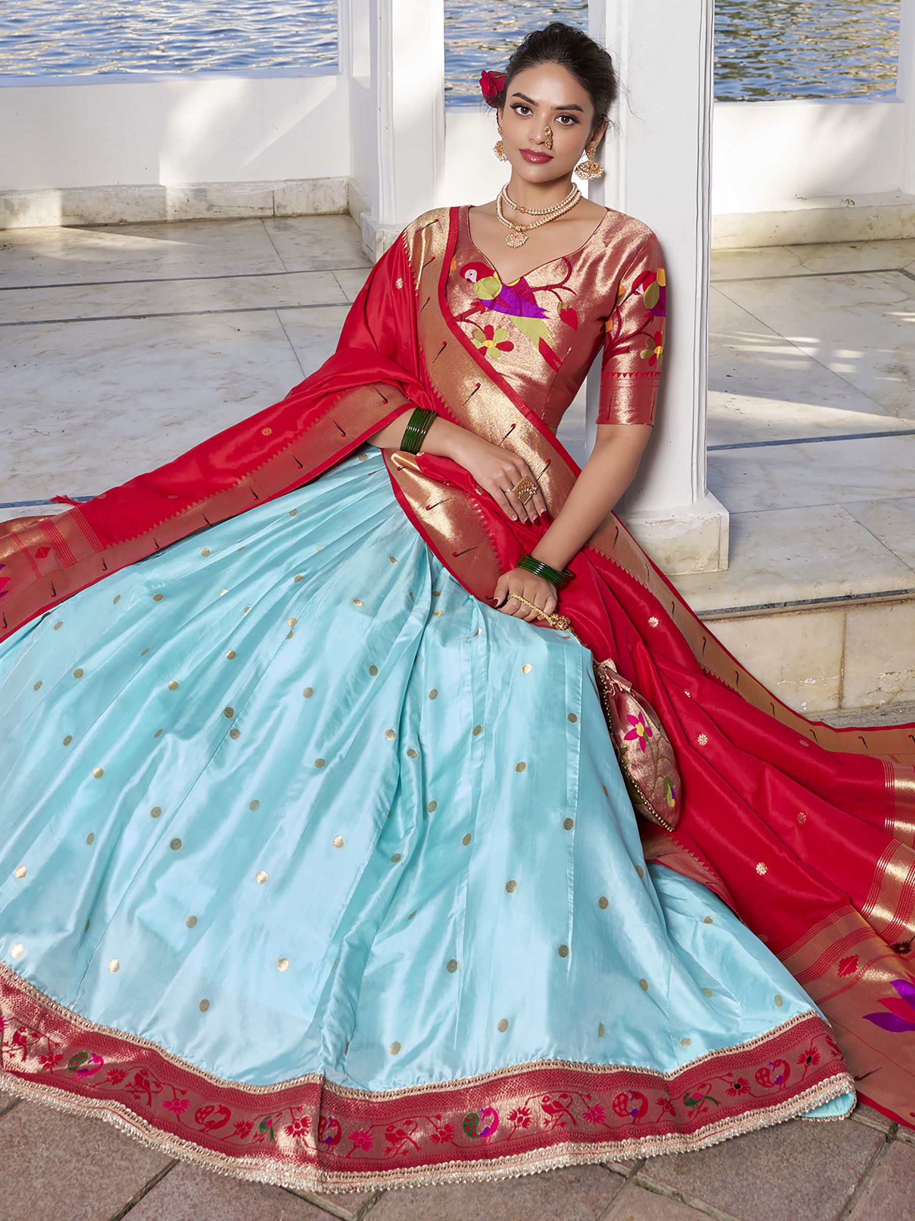 Sky Blue Jacquard Silk Paithani Lehenga Choli with zari weaving, lace accents, tassel dupatta, and matching batwa – traditional Maharashtrian festive attire