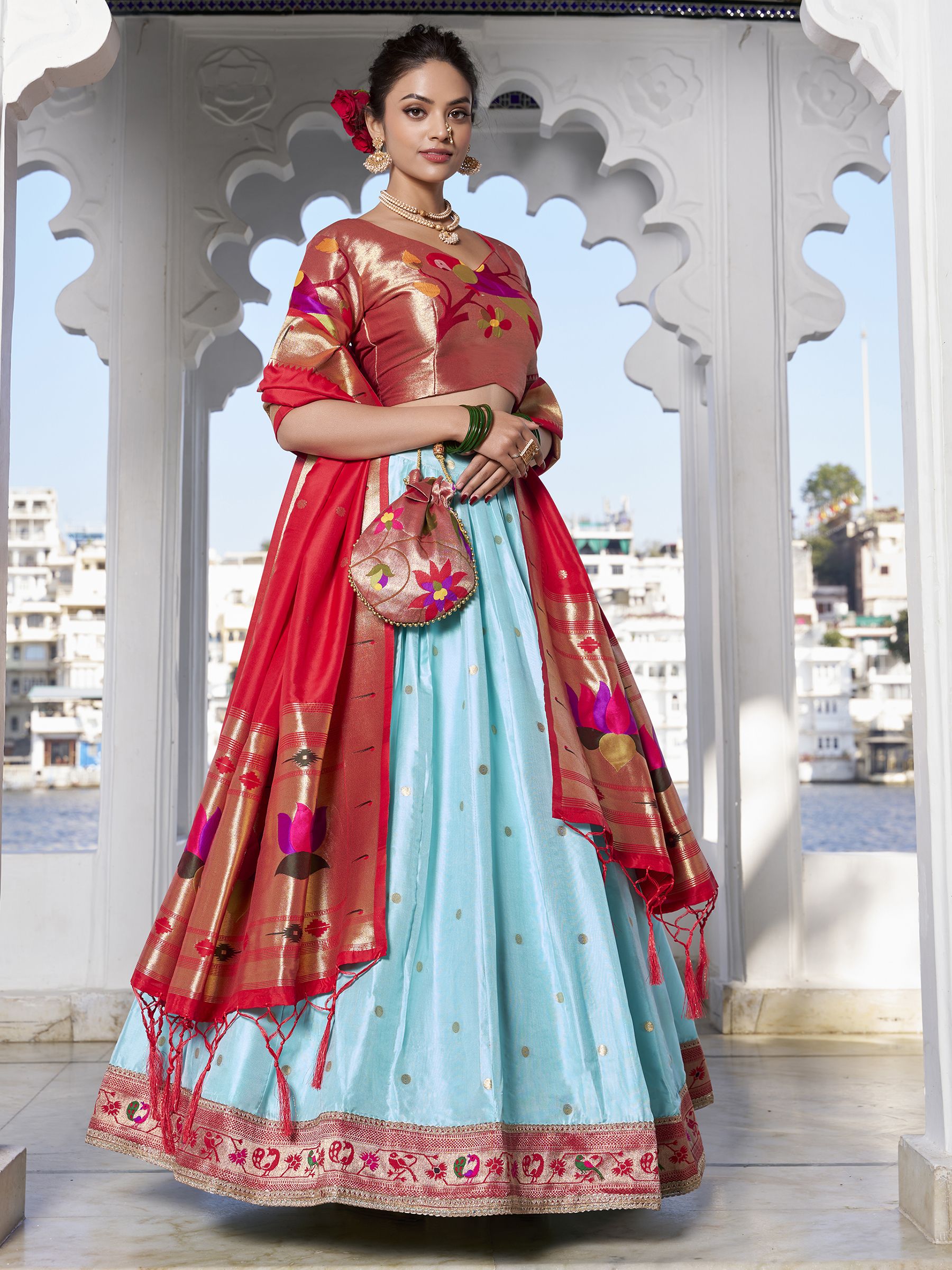 Sky Blue Jacquard Silk Paithani Lehenga Choli with zari weaving, lace accents, tassel dupatta, and matching batwa – traditional Maharashtrian festive attire