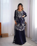 Tanvisha blue embroidered sharara suit set featuring faux georgette fabric with thread and sequin embroidery on top, sharara pants, and a dupatta with lace border – perfect for weddings, festive occasions, and luxury ethnic wear 