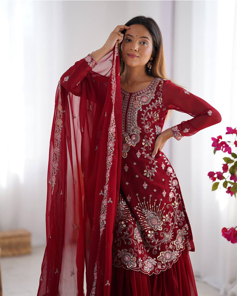 Tanvisha maroon embroidered sharara suit set featuring faux georgette fabric with thread and sequin embroidery on top, sharara pants, and a dupatta with lace border – perfect for weddings, festive occasions, and luxury ethnic wear 
