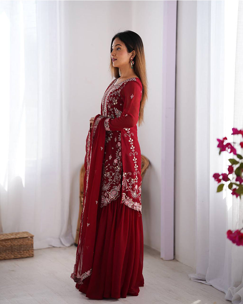 Tanvisha maroon embroidered sharara suit set featuring faux georgette fabric with thread and sequin embroidery on top, sharara pants, and a dupatta with lace border – perfect for weddings, festive occasions, and luxury ethnic wear 