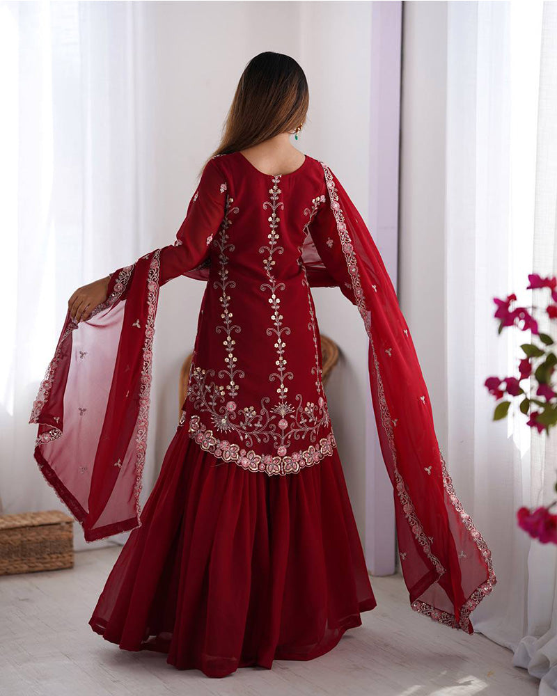 Tanvisha maroon embroidered sharara suit set featuring faux georgette fabric with thread and sequin embroidery on top, sharara pants, and a dupatta with lace border – perfect for weddings, festive occasions, and luxury ethnic wear 
