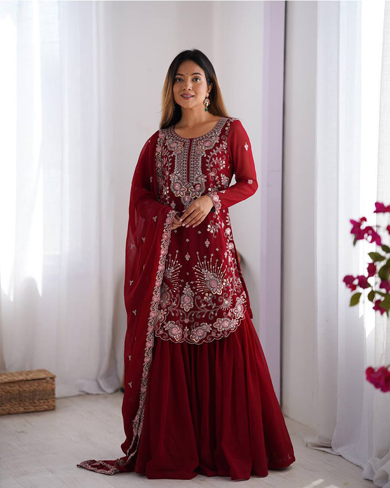 Tanvisha maroon embroidered sharara suit set featuring faux georgette fabric with thread and sequin embroidery on top, sharara pants, and a dupatta with lace border – perfect for weddings, festive occasions, and luxury ethnic wear 