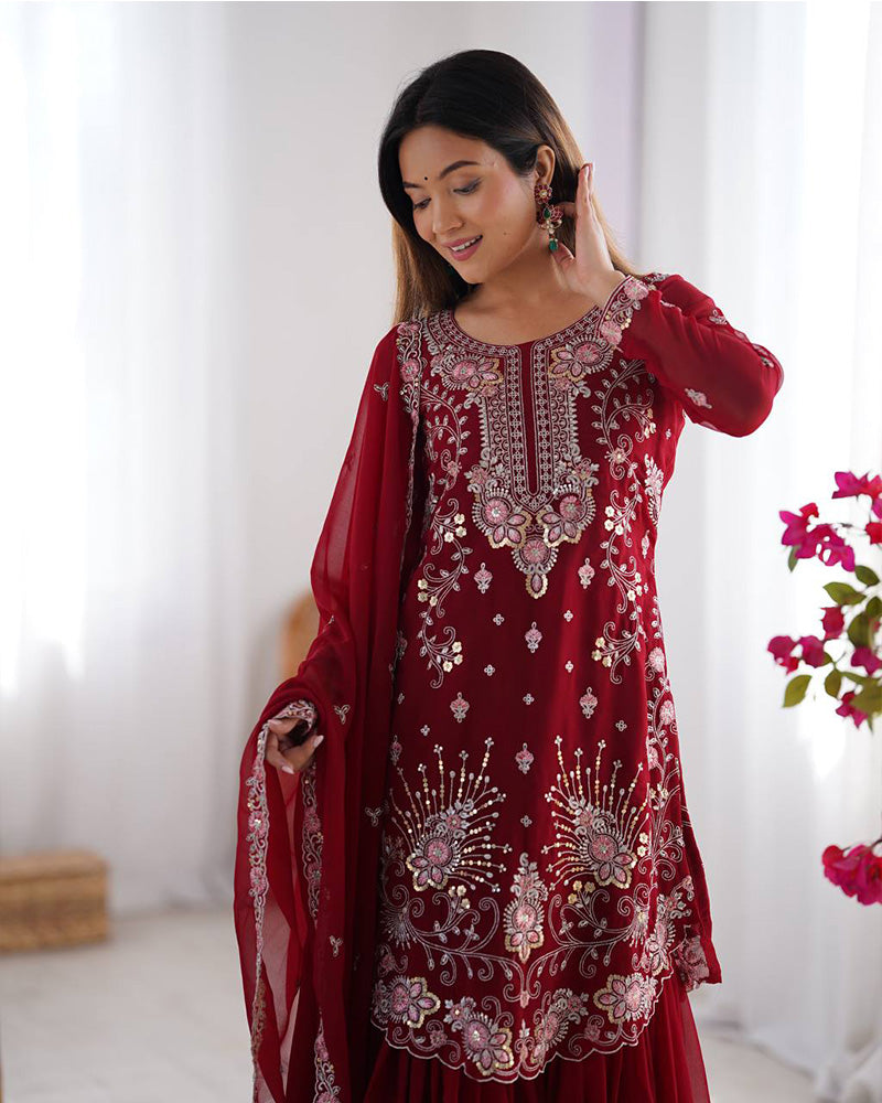 Tanvisha maroon embroidered sharara suit set featuring faux georgette fabric with thread and sequin embroidery on top, sharara pants, and a dupatta with lace border – perfect for weddings, festive occasions, and luxury ethnic wear 