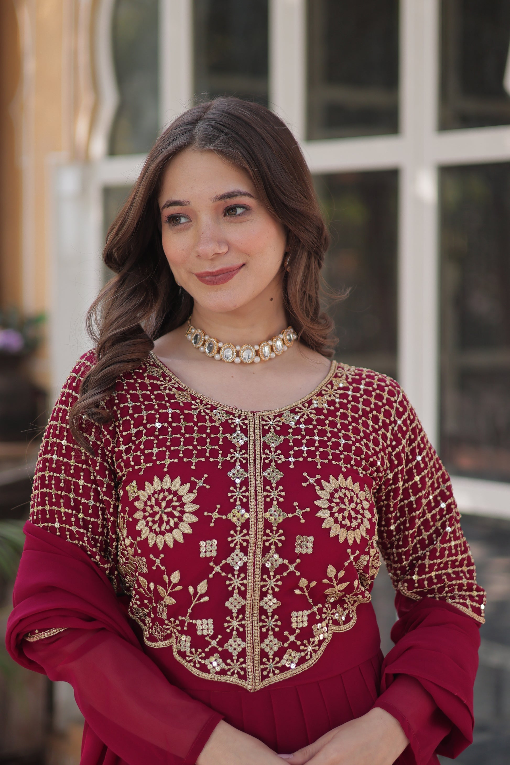 The **Tarakini Pink Embroidered Anarkali Gown Set** is a stunning blend of tradition and modern elegance, designed for grand occasions like weddings, festive celebrations, and parties. Crafted from **premium faux blooming georgette**, this **designer Anarkali gown** features intricate embroidery, a voluminous 3.5-meter flair, and a soft cotton lining for all-day comfort. 

With its **floor-length silhouette (56 inches), full sleeves, and classic round neck**, this heavy embroidered gown ensures a regal pres