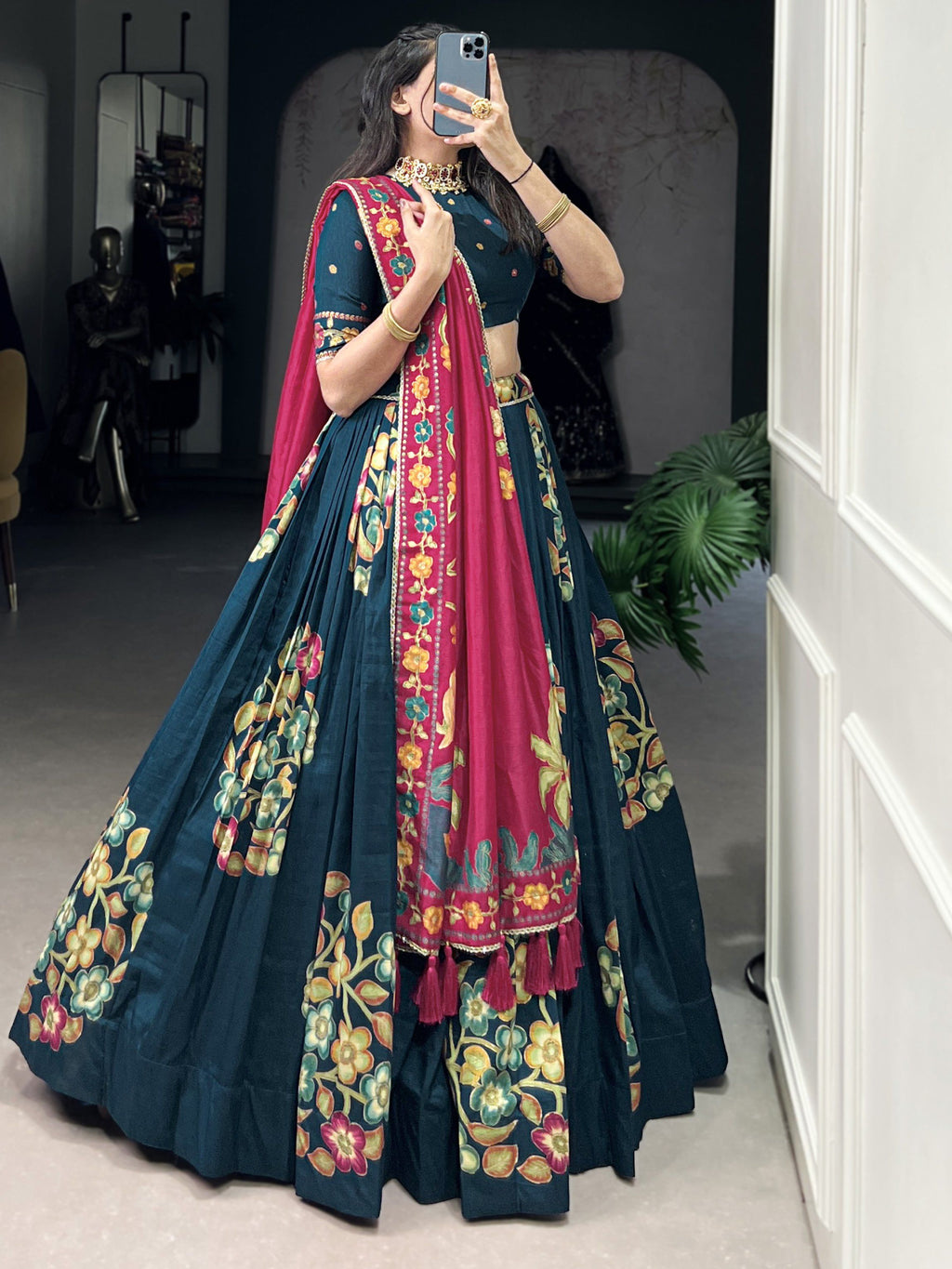 Teal blue tussar silk printed and foil work lehenga choli