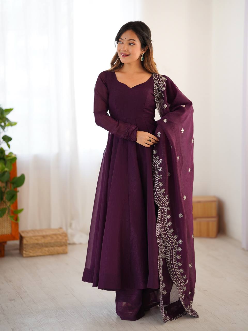 Tiya purple Fandy Silk Anarkali suit with 4.5-meter flair, full sleeves & embroidered dupatta – stitched & ready for weddings, parties & festive wear.