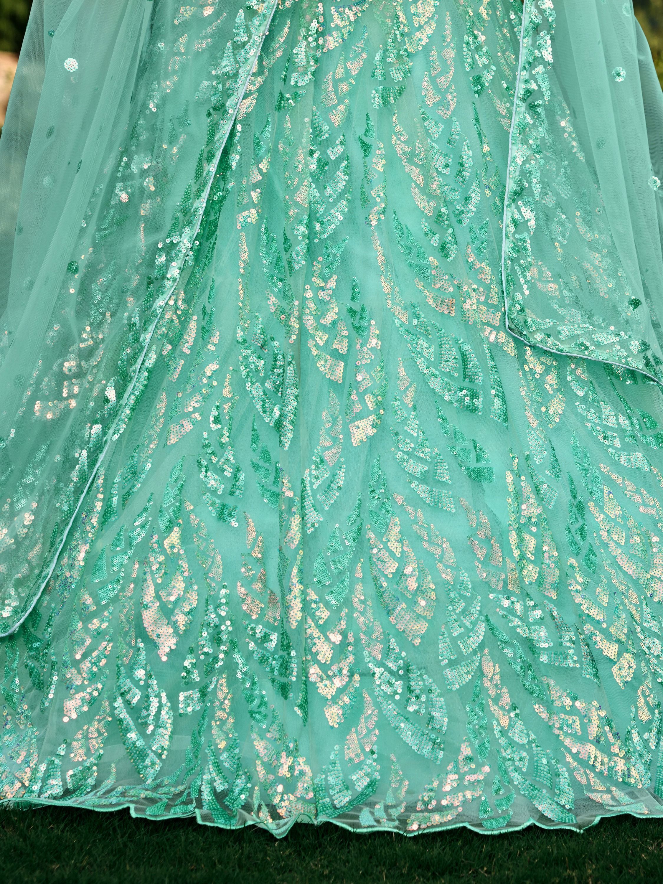 Turquoise Soft Net Lehenga Choli with Heavy Multi Sequins Embroidery and Lace Border Dupatta Perfect for Weddings and Glam Parties