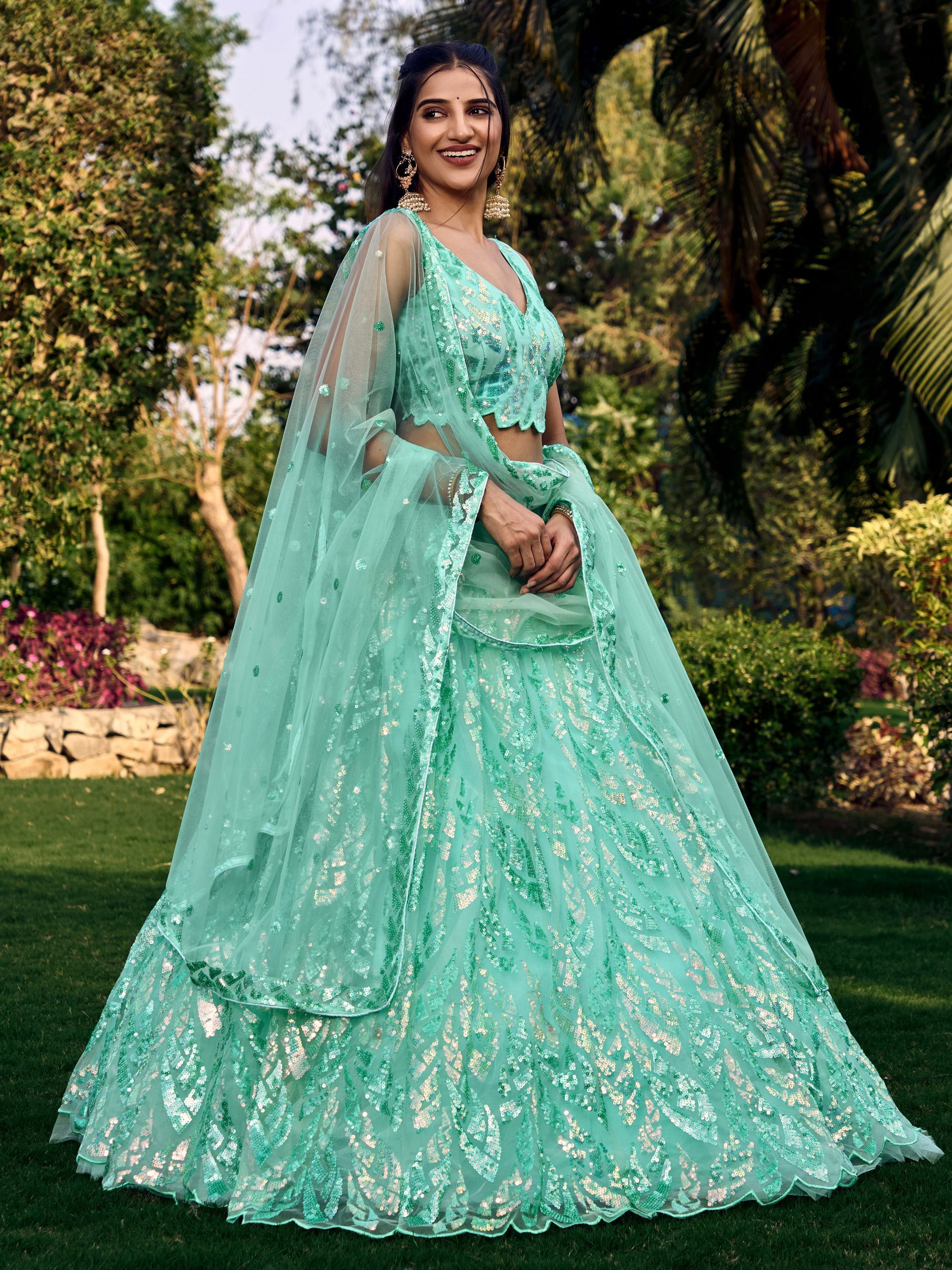 Turquoise Soft Net Lehenga Choli with Heavy Multi Sequins Embroidery and Lace Border Dupatta Perfect for Weddings and Glam Parties