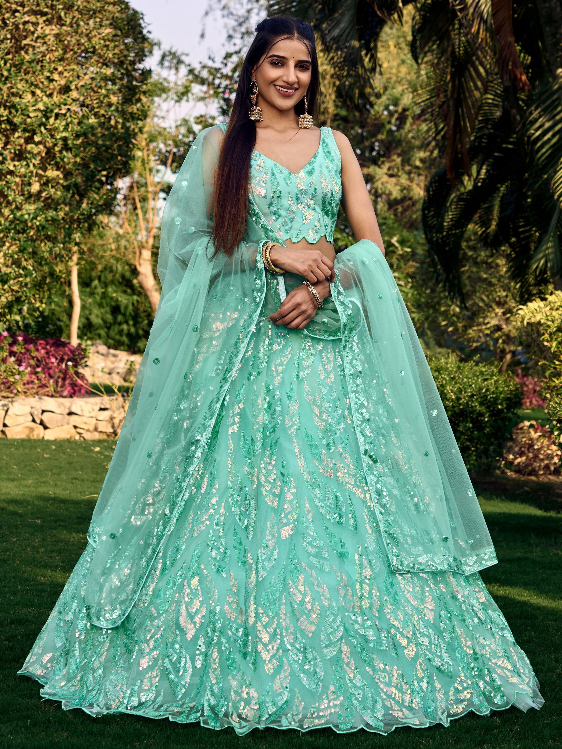 Turquoise Soft Net Lehenga Choli with Heavy Multi Sequins Embroidery and Lace Border Dupatta Perfect for Weddings and Glam Parties