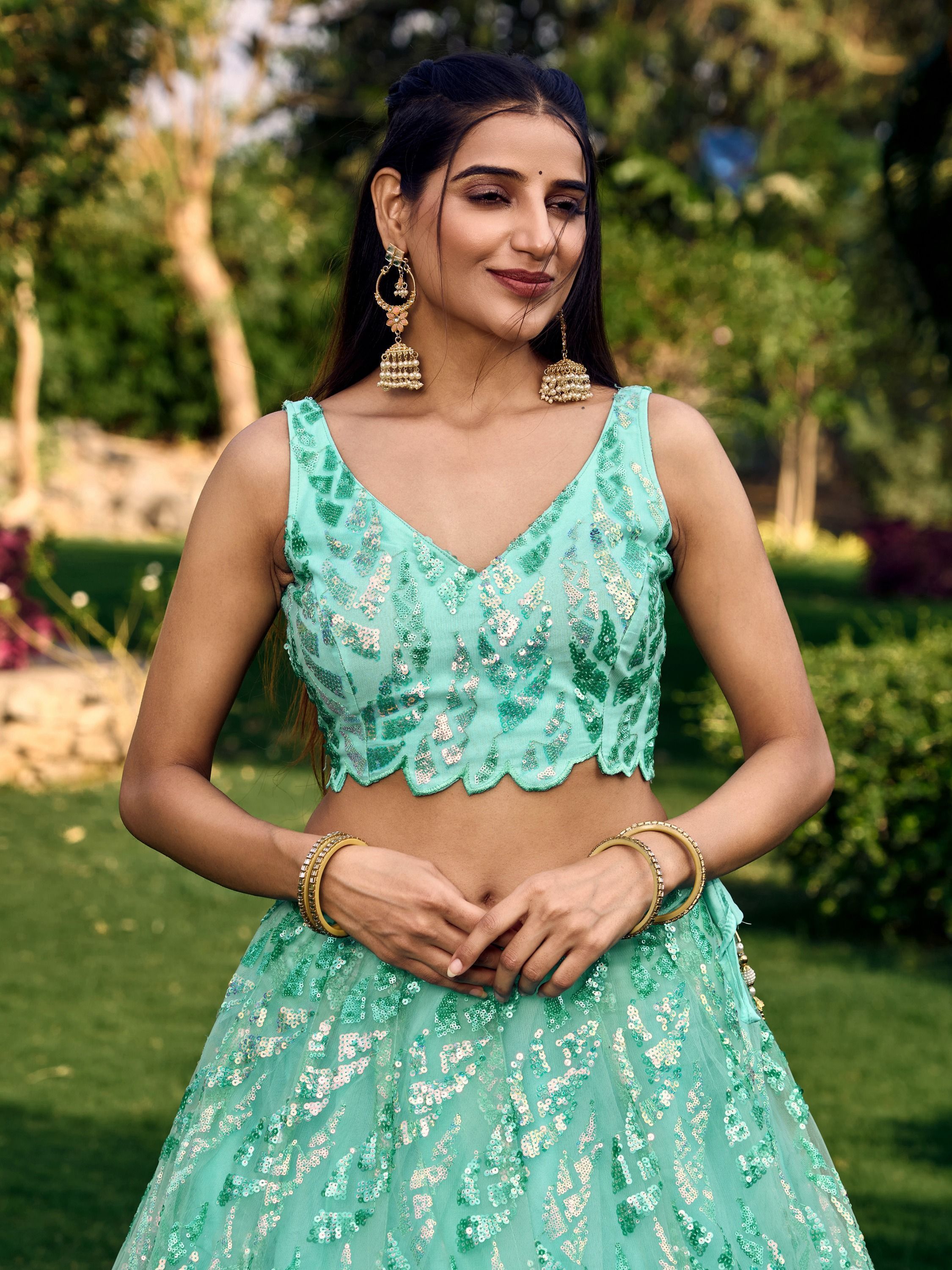 Turquoise Soft Net Lehenga Choli with Heavy Multi Sequins Embroidery and Lace Border Dupatta Perfect for Weddings and Glam Parties