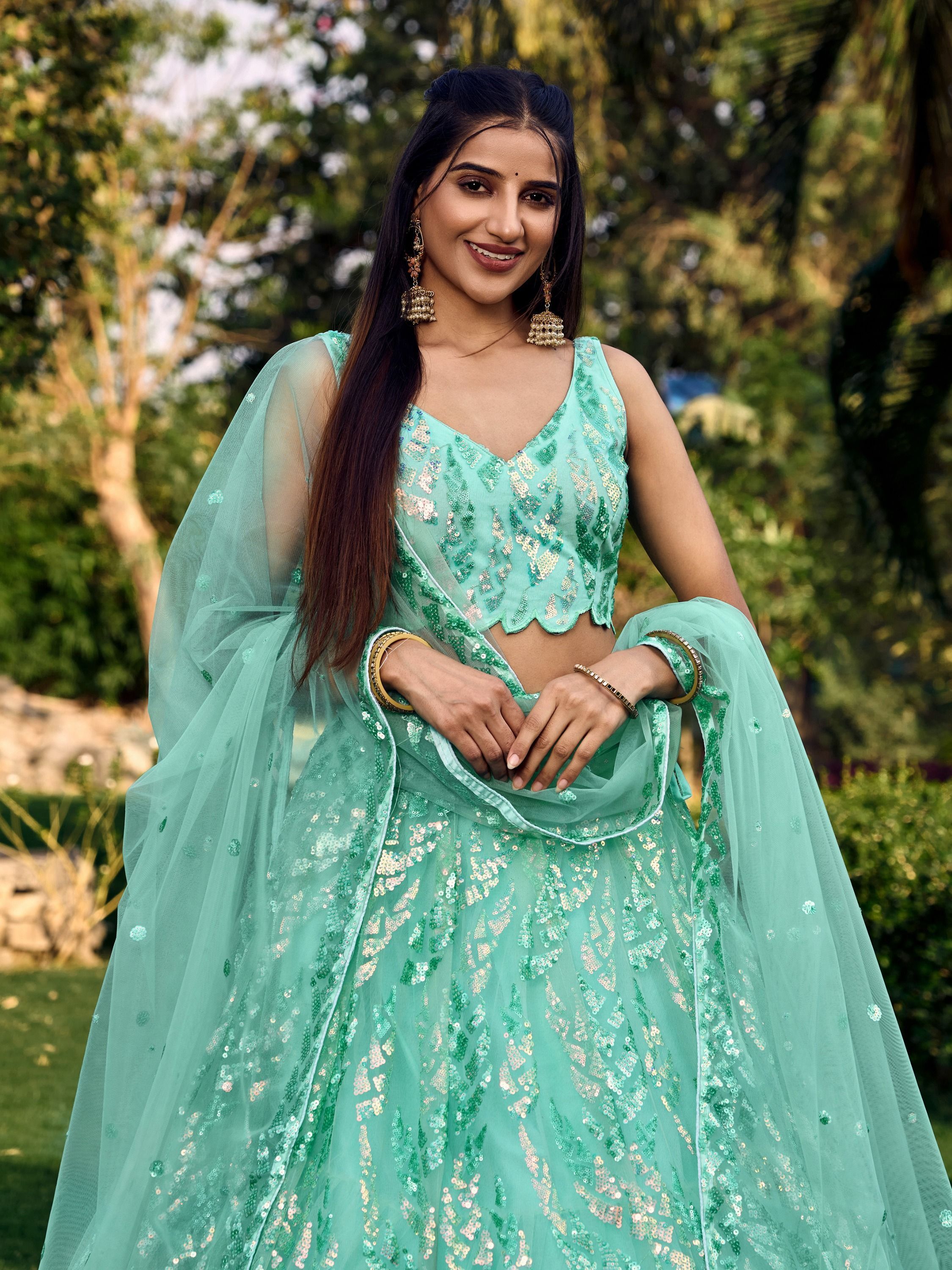 Turquoise Soft Net Lehenga Choli with Heavy Multi Sequins Embroidery and Lace Border Dupatta Perfect for Weddings and Glam Parties