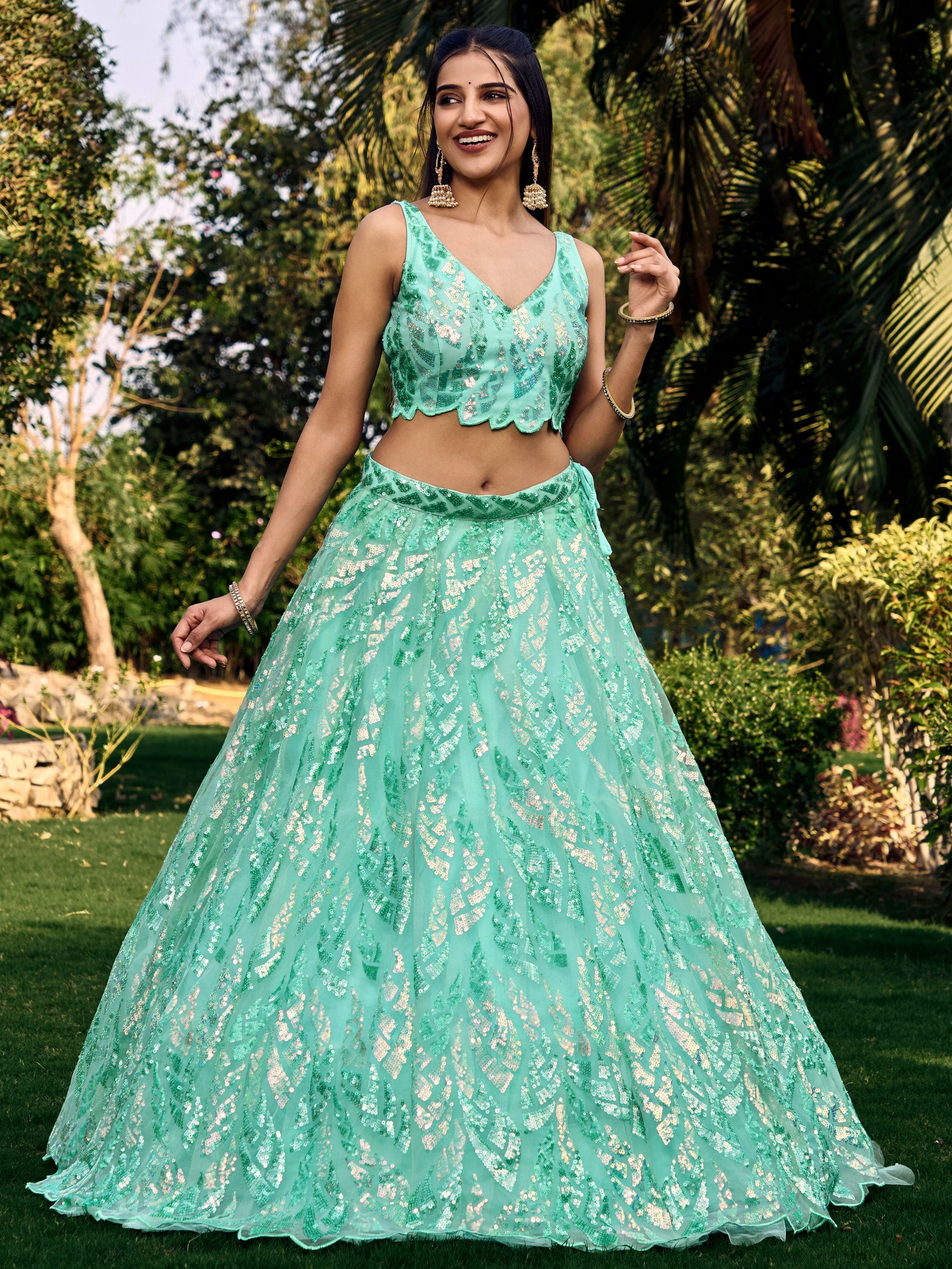 Turquoise Soft Net Lehenga Choli with Heavy Multi Sequins Embroidery and Lace Border Dupatta Perfect for Weddings and Glam Parties