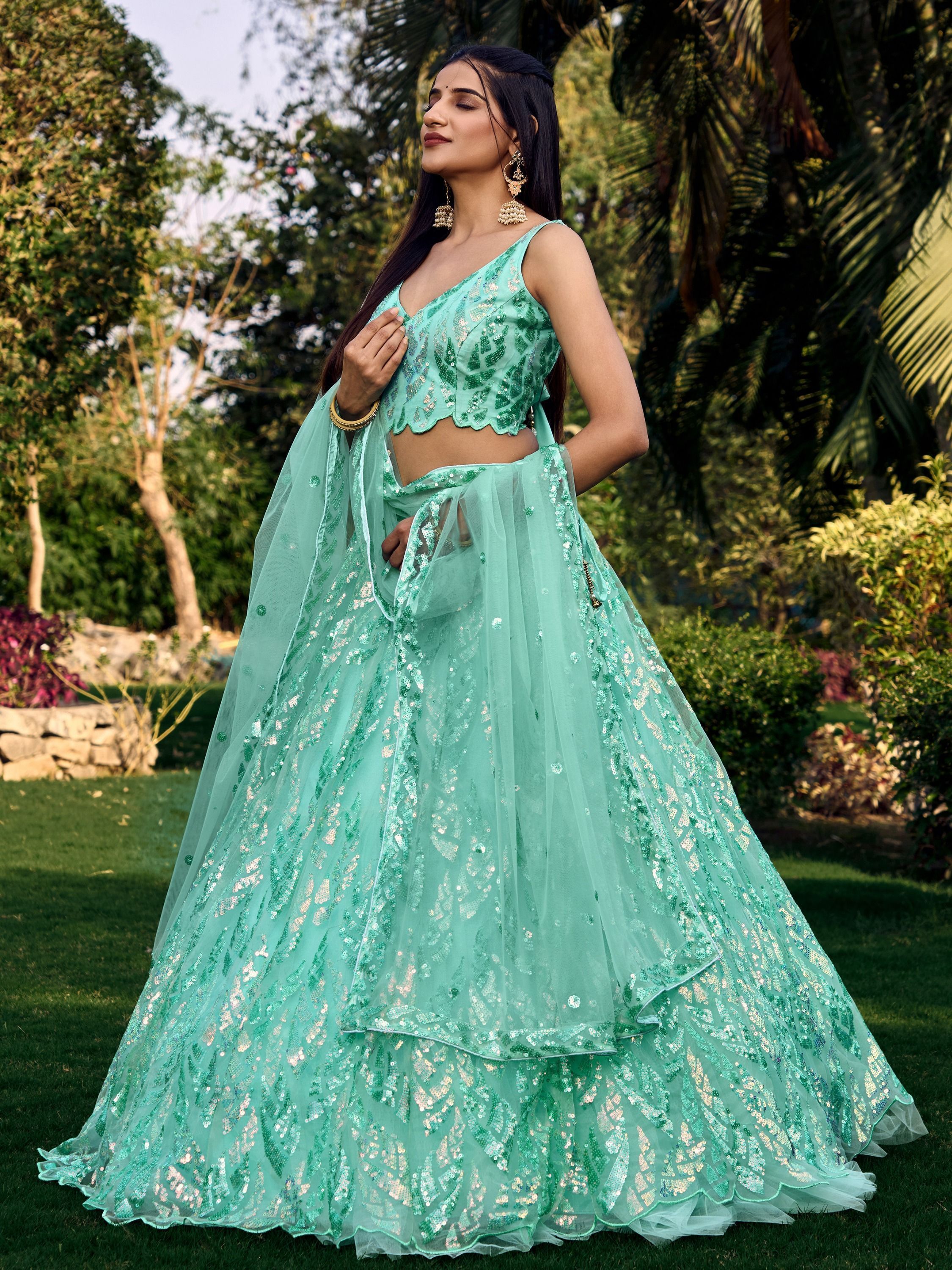 Turquoise Soft Net Lehenga Choli with Heavy Multi Sequins Embroidery and Lace Border Dupatta Perfect for Weddings and Glam Parties