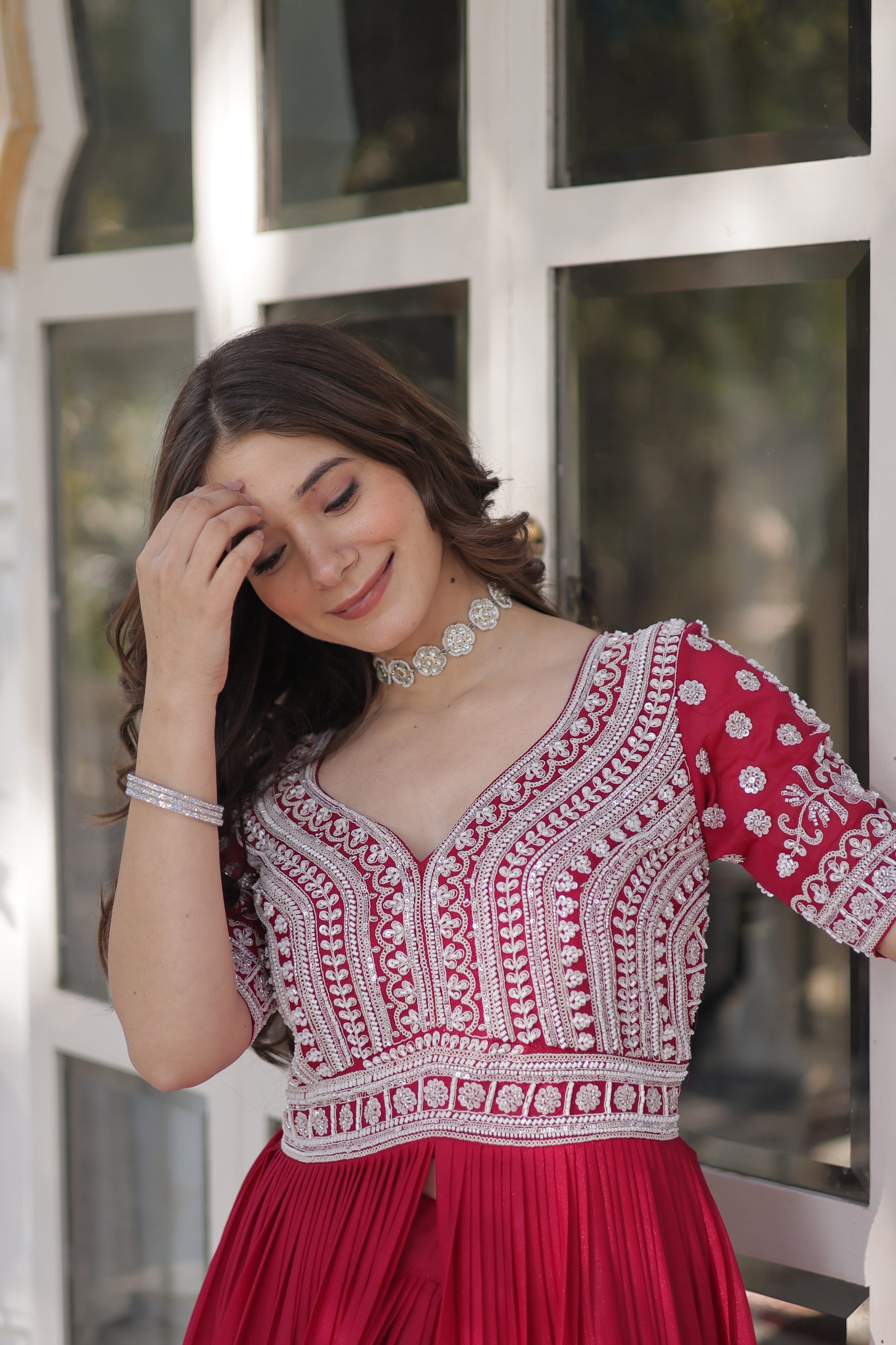 Umaira pink Indo-western embroidered kurti lehenga set for women featuring slit-cut long kurti with sequins, beads, and threadwork on star georgette fabric, paired with stitched lehenga and latkan detailing – ideal for weddings, festive functions, sangeet, and modern ethnic occasions.