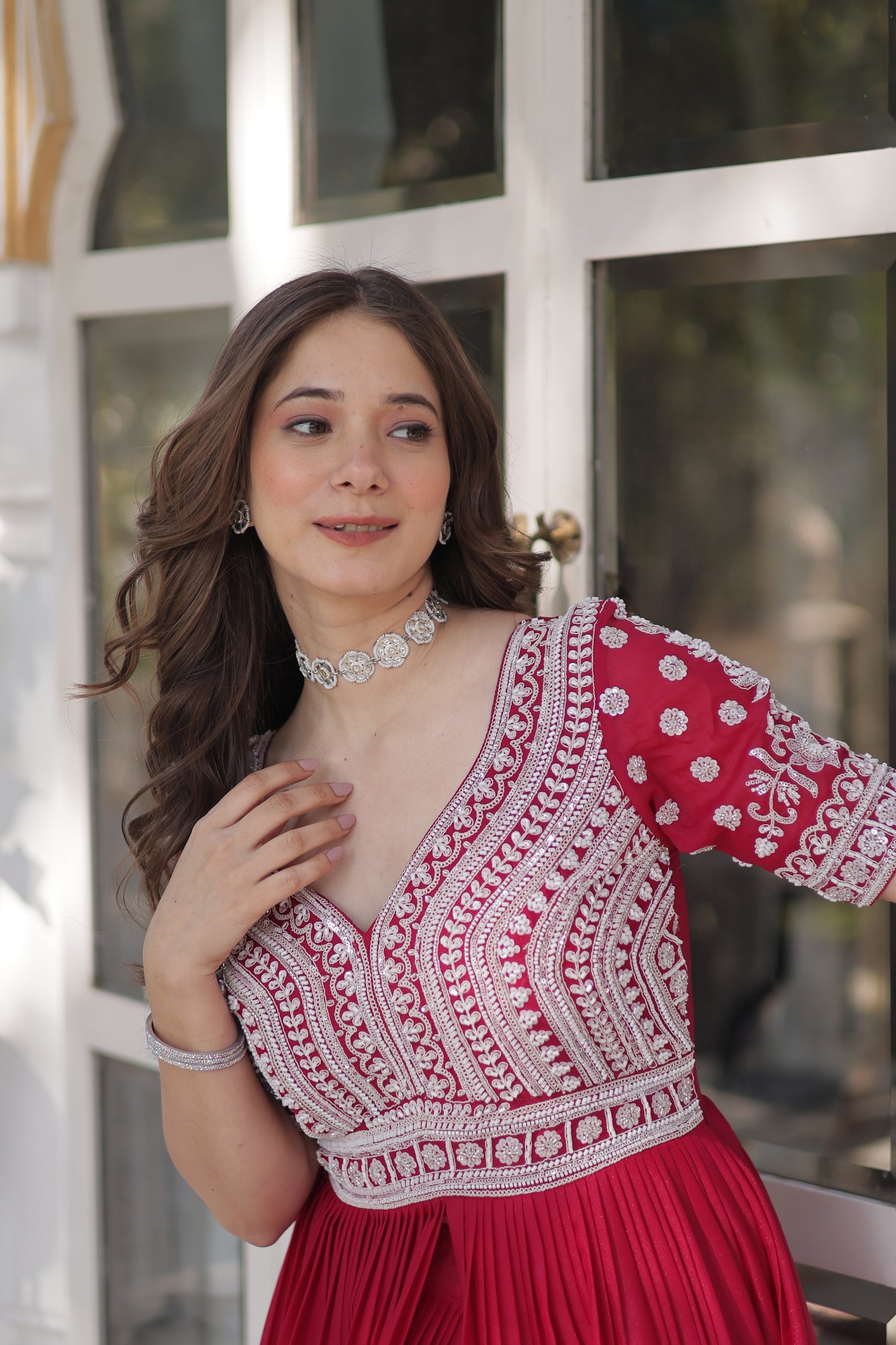 Umaira pink Indo-western embroidered kurti lehenga set for women featuring slit-cut long kurti with sequins, beads, and threadwork on star georgette fabric, paired with stitched lehenga and latkan detailing – ideal for weddings, festive functions, sangeet, and modern ethnic occasions.