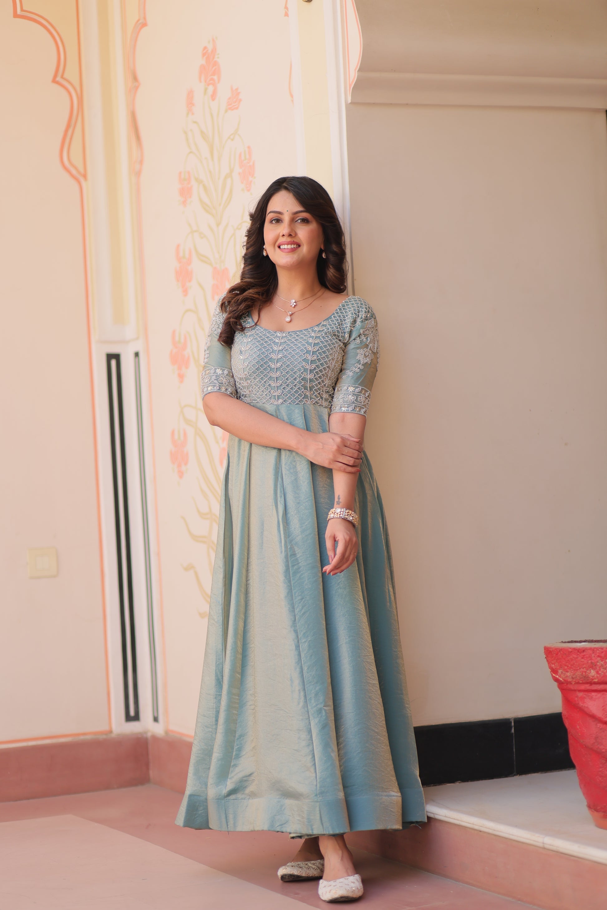 Vaibhavi Sky Blue Gown in Fendy Silk with beads embroidery, 3.5m flair & boat neck – fully stitched elegance for festive occasions.