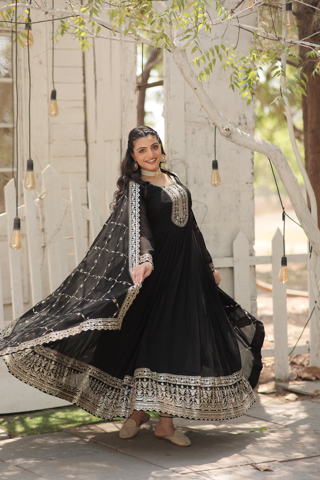 Vasundhara black faux blooming Anarkali gown suit set