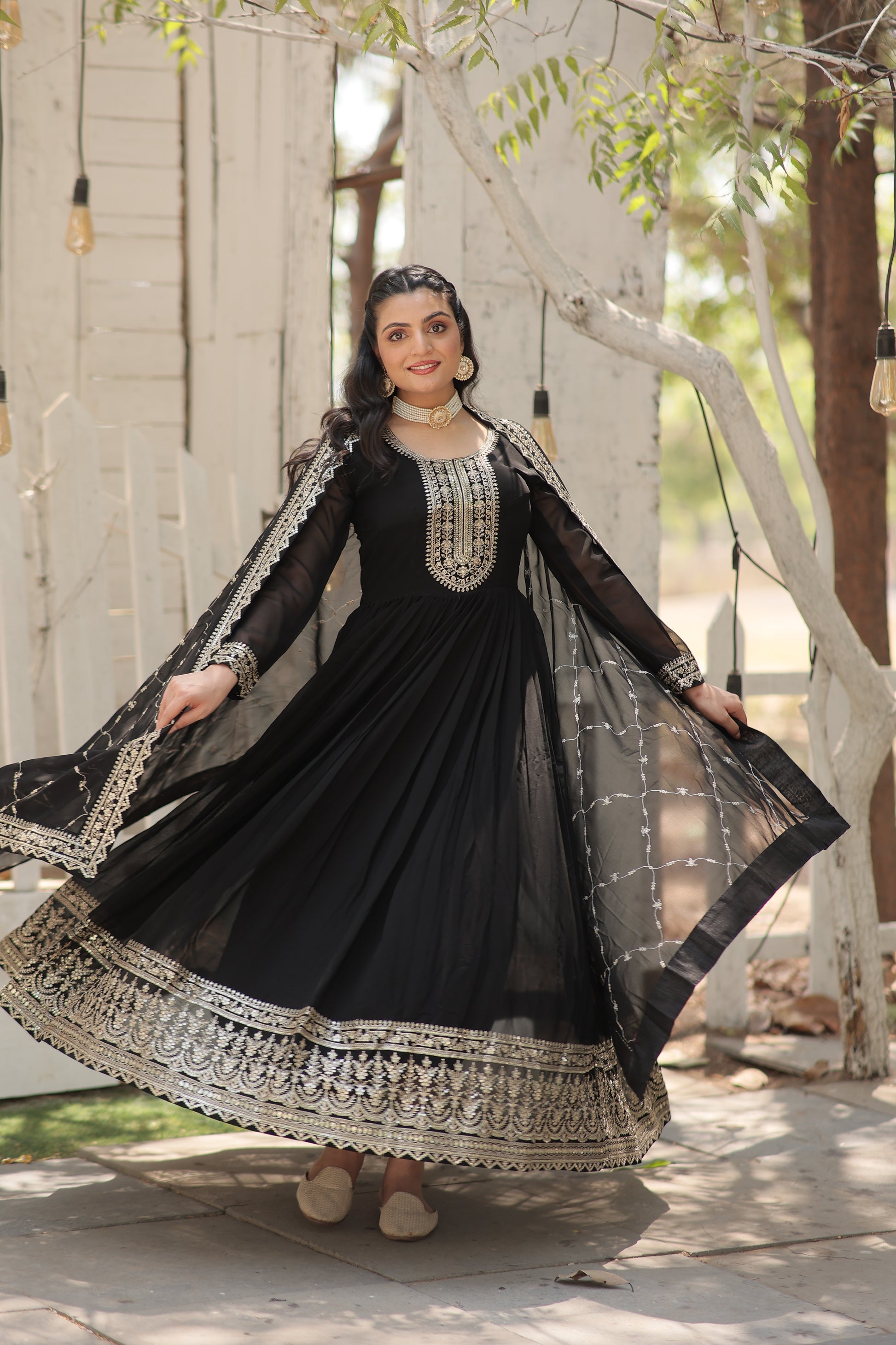 Vasundhara black faux blooming Anarkali gown suit set