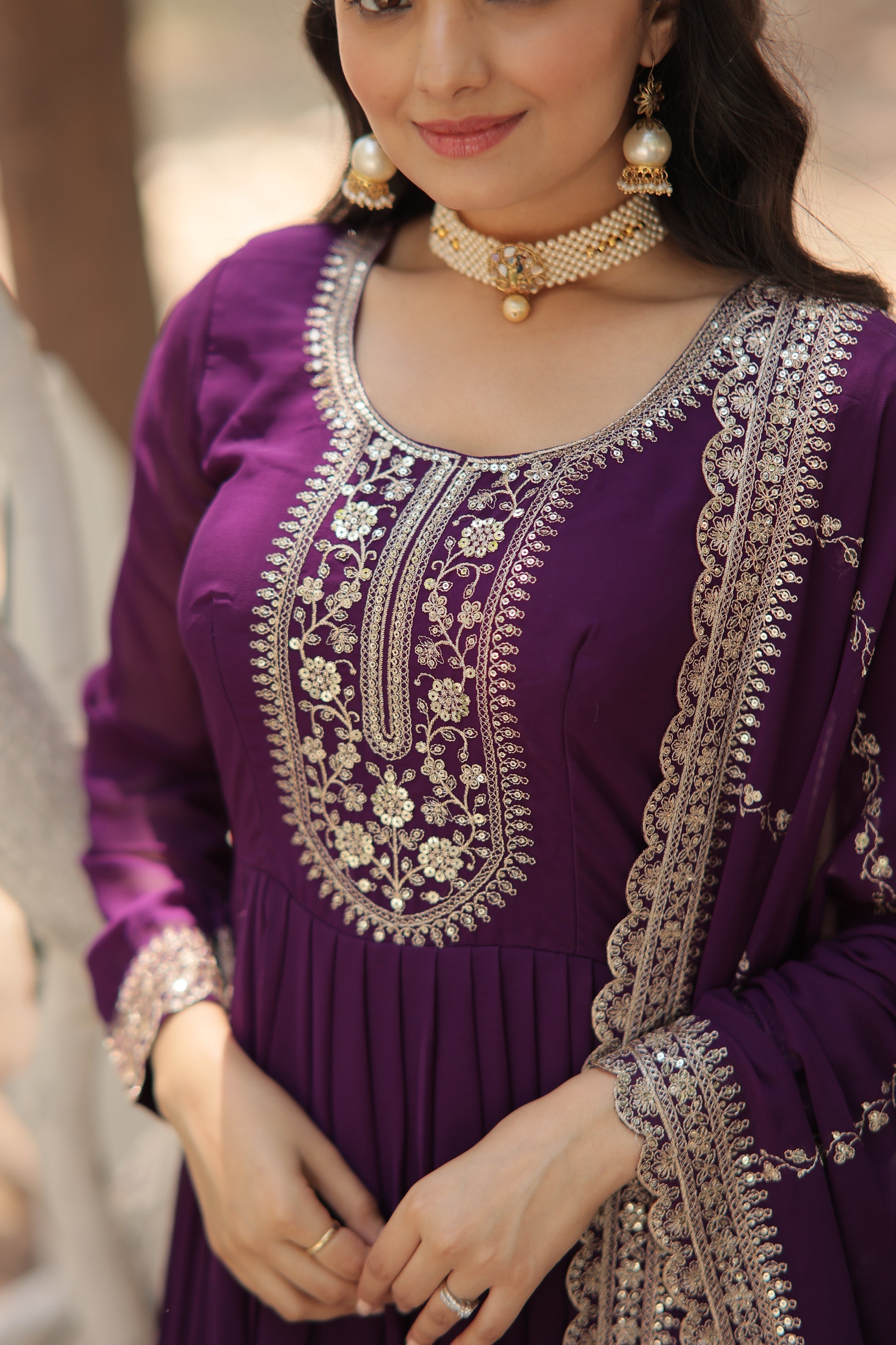 Vasundhara purple faux blooming Anarkali gown suit set