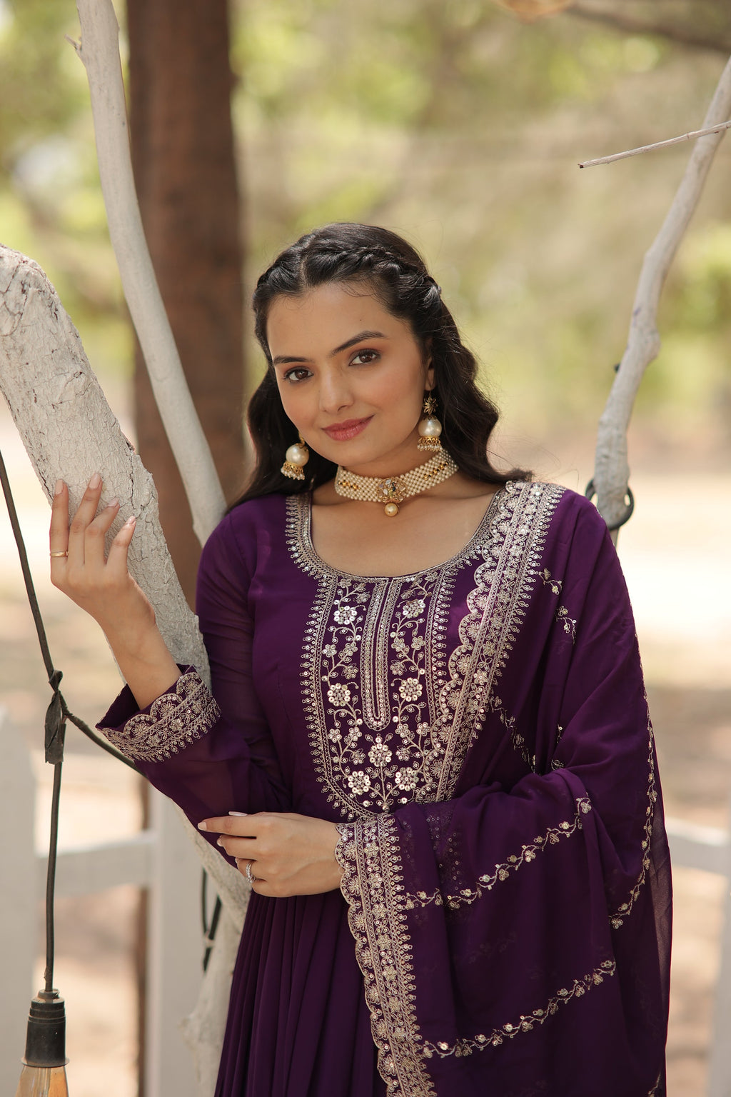 Vasundhara purple faux blooming Anarkali gown suit set